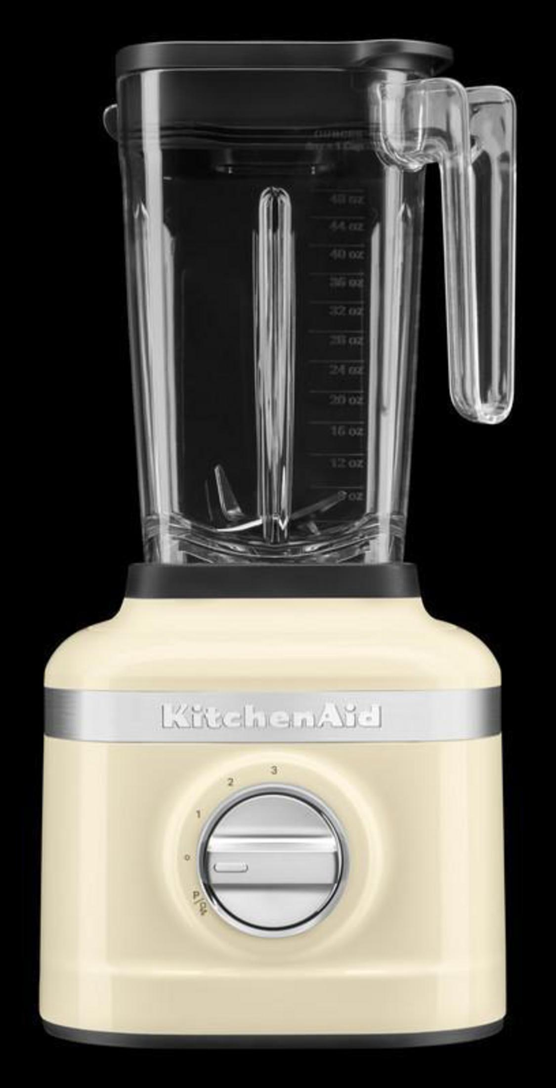 A cream-colored blender with a glass jar and a silver dial.