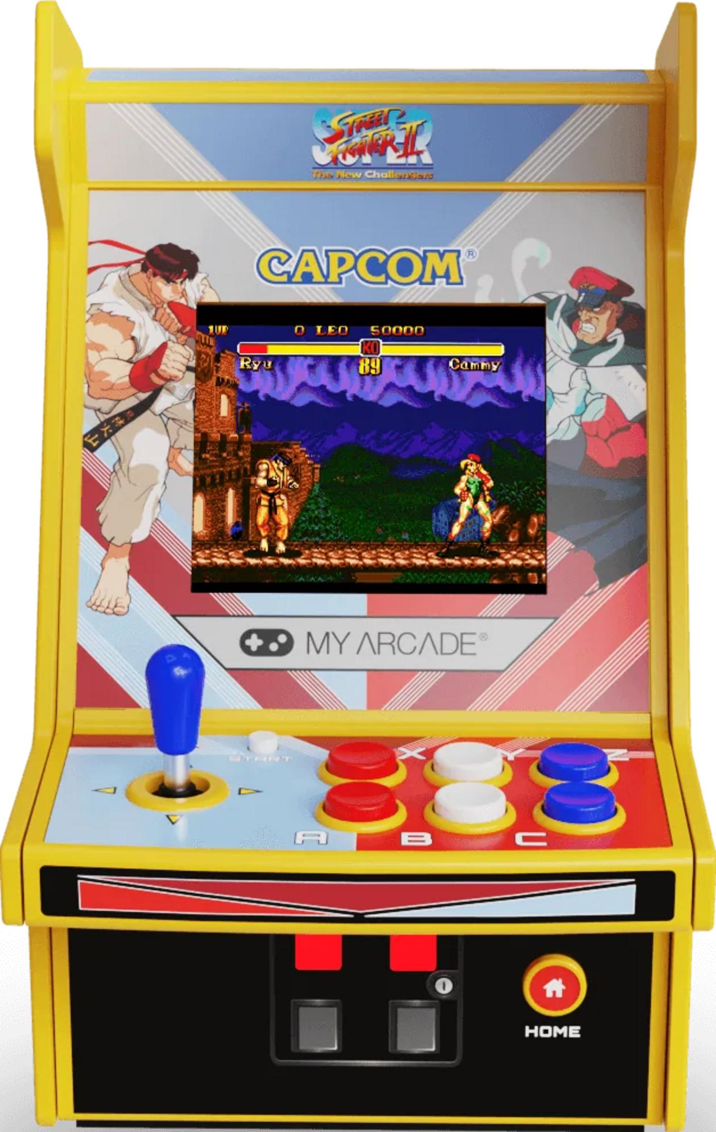 Żółta maszyna zręcznościowa ze grafiką Street Fighter II i ekranem gry. Niebieski joystick i kolorowe przyciski.