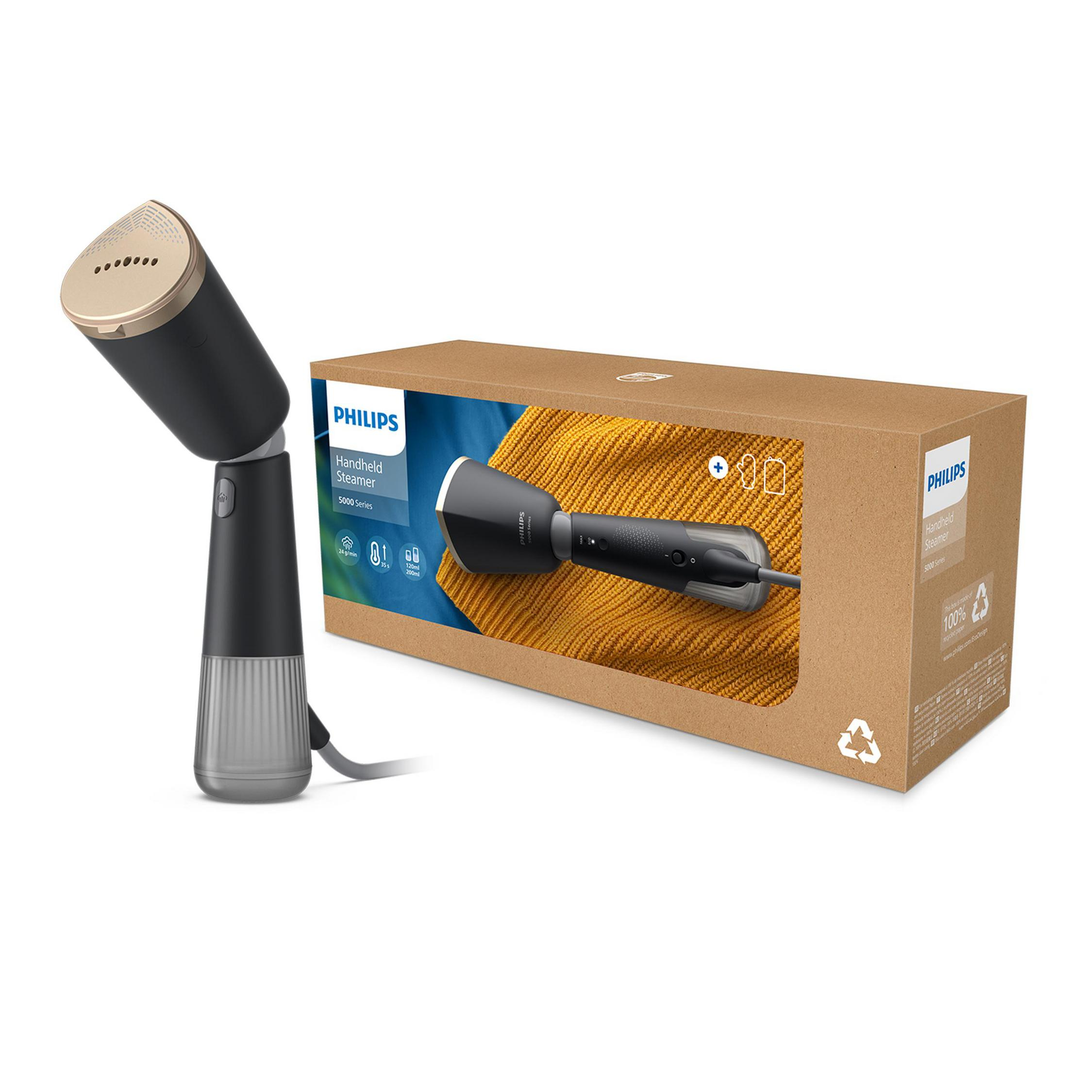 Czarny podręczny parownica Philips obok pudełka z pomarańczowym swetrem.