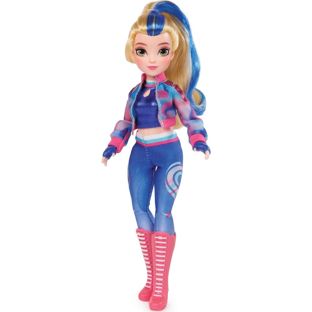 Lalka z blond włosami i niebieskimi pasemkami, nosi niebieskie legginsy i kolorową kurtkę.