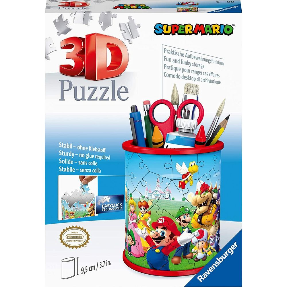 Pojemnik Super Mario 3D Puzzle z długopisami, pędzlami i nożyczkami.