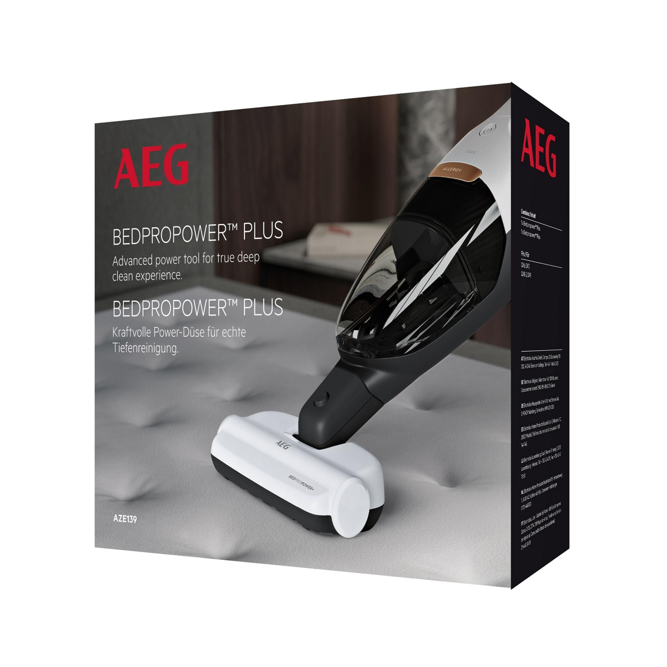 AEG Bedpropower Plus Handstaubsauger auf einer Matratze, Produktverpackung.