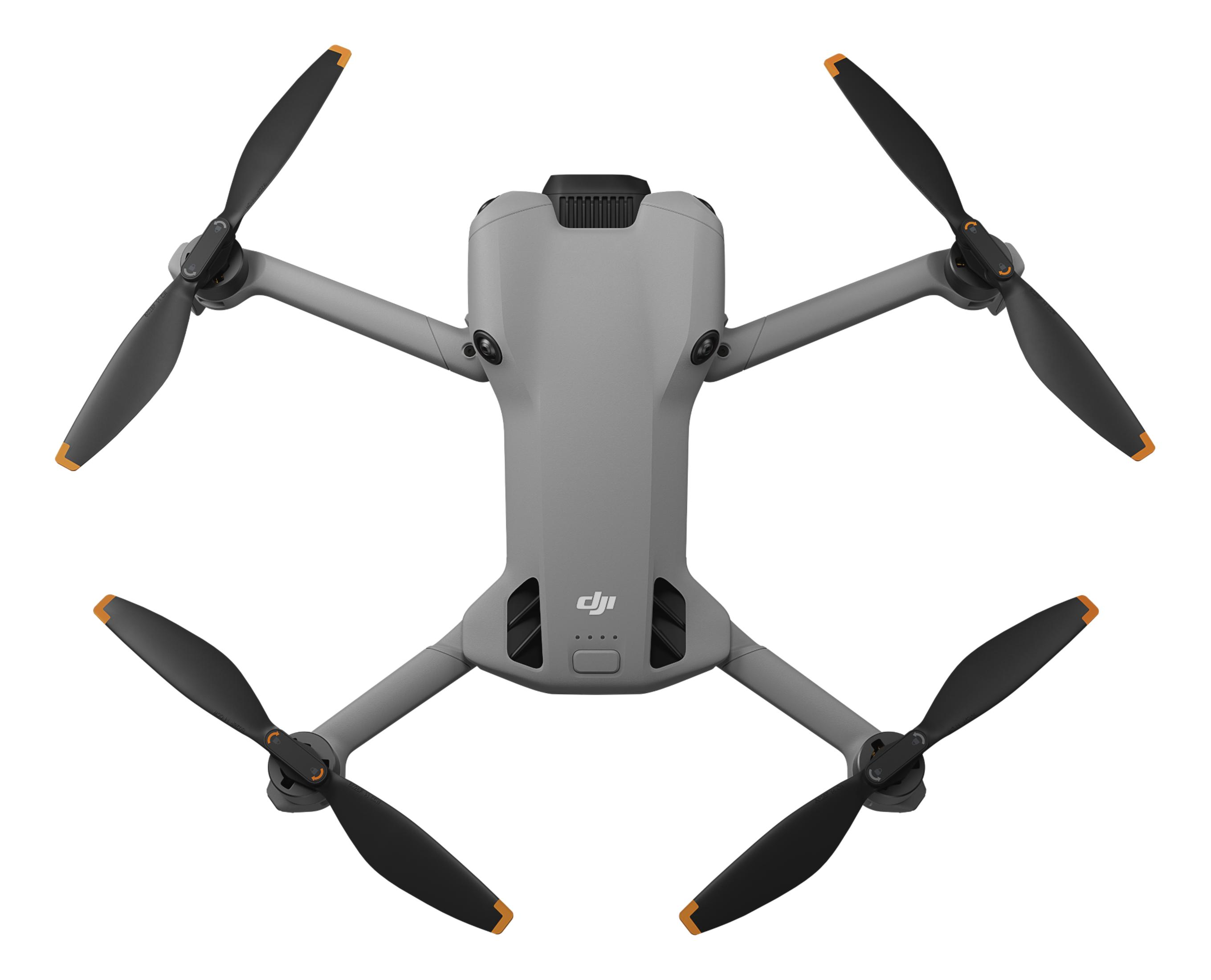Szara dron DJI z czterema czarnymi śmigłami z pomarańczowymi końcówkami.