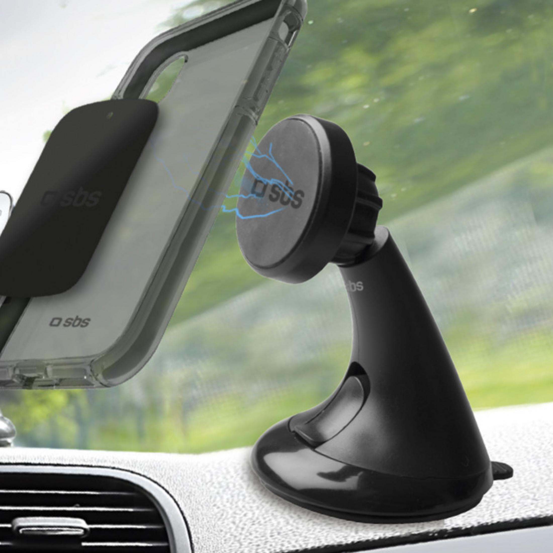 Un supporto magnetico nero per telefono con un telefono in una custodia trasparente su un cruscotto.