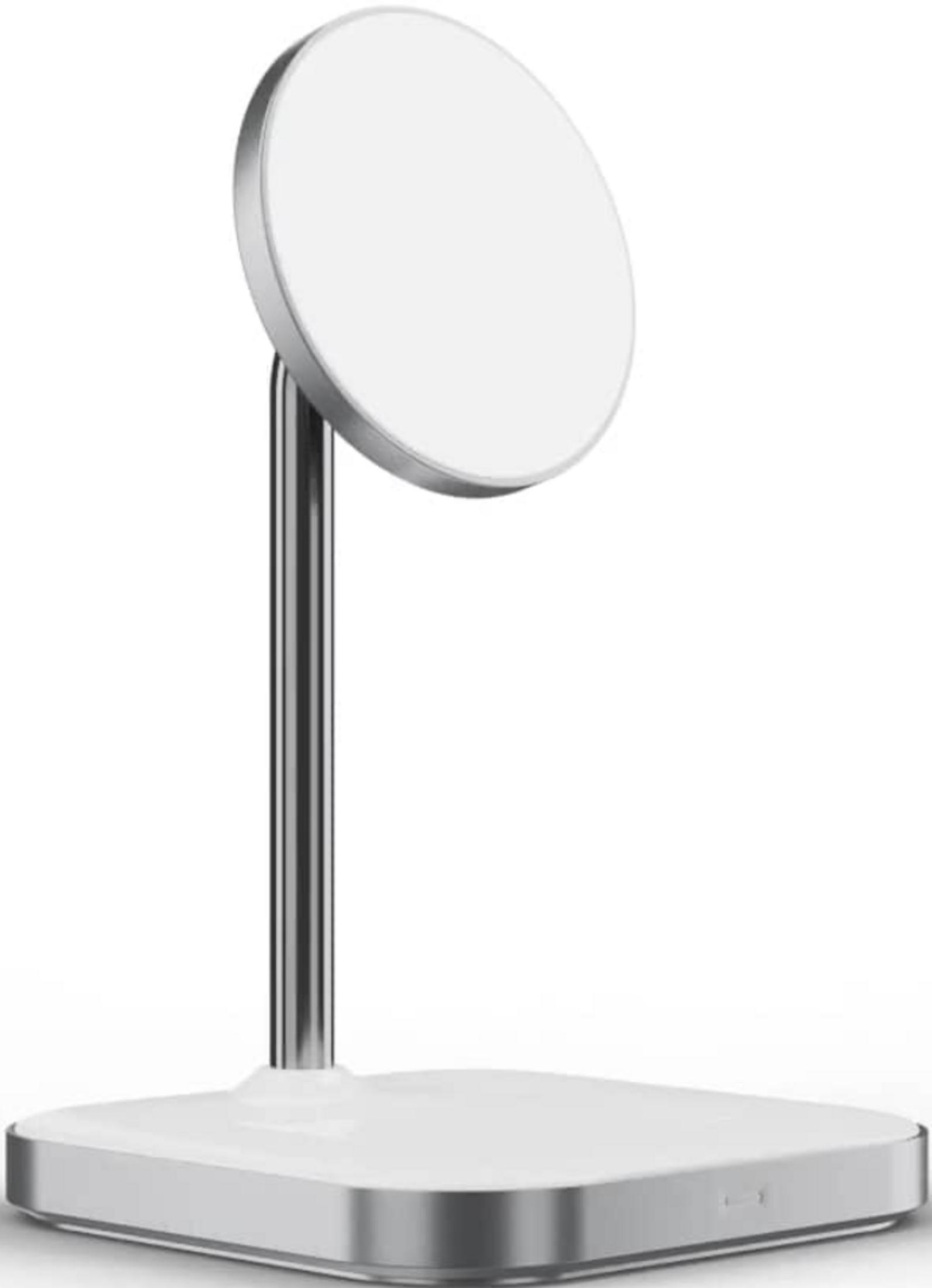 Un supporto di ricarica bianco con stelo argentato e disco rotondo.