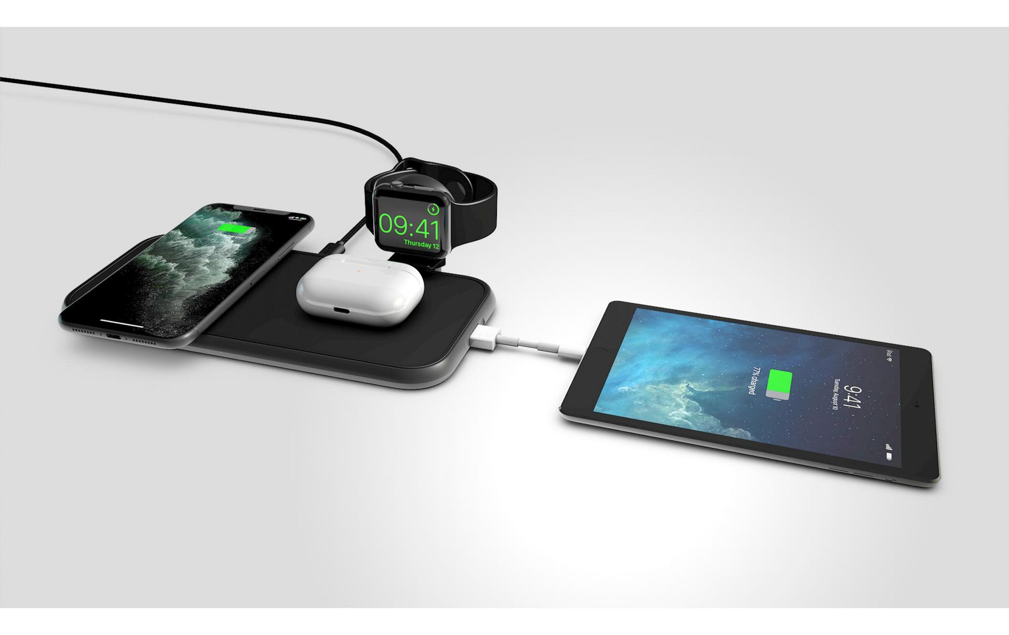 Ein schwarzes Ladegerät mit iPhone, AirPods und Apple Watch.