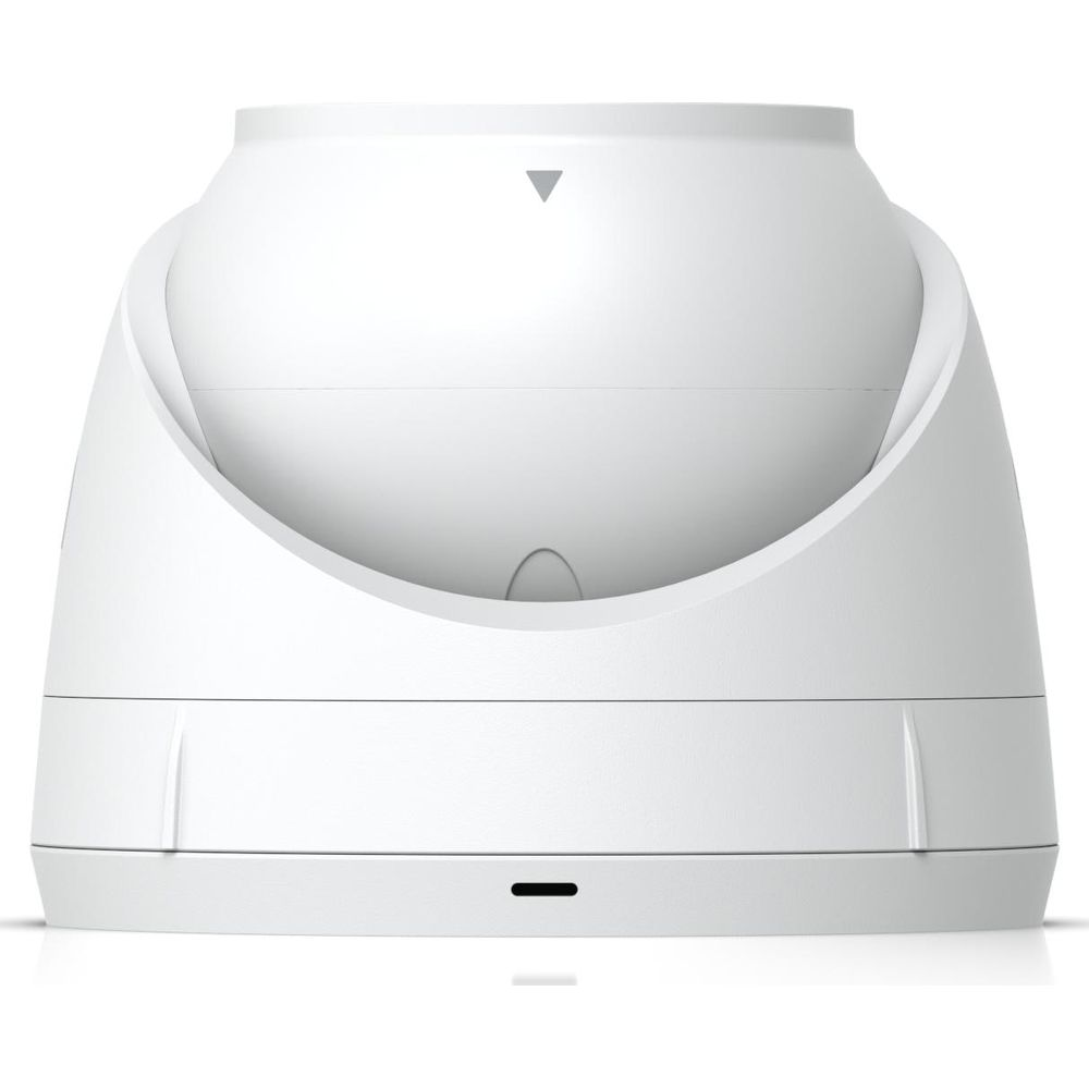 Biały, okrągły przedmiot ze strzałką skierowaną w dół na górze.