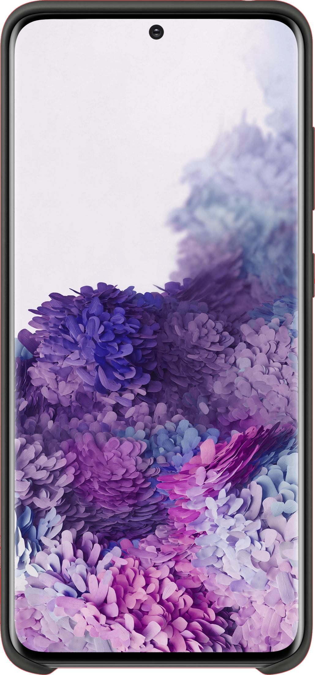 Smartfon wyświetlający kolorową, abstrakcyjną tapetę z motywem kwiatowym.