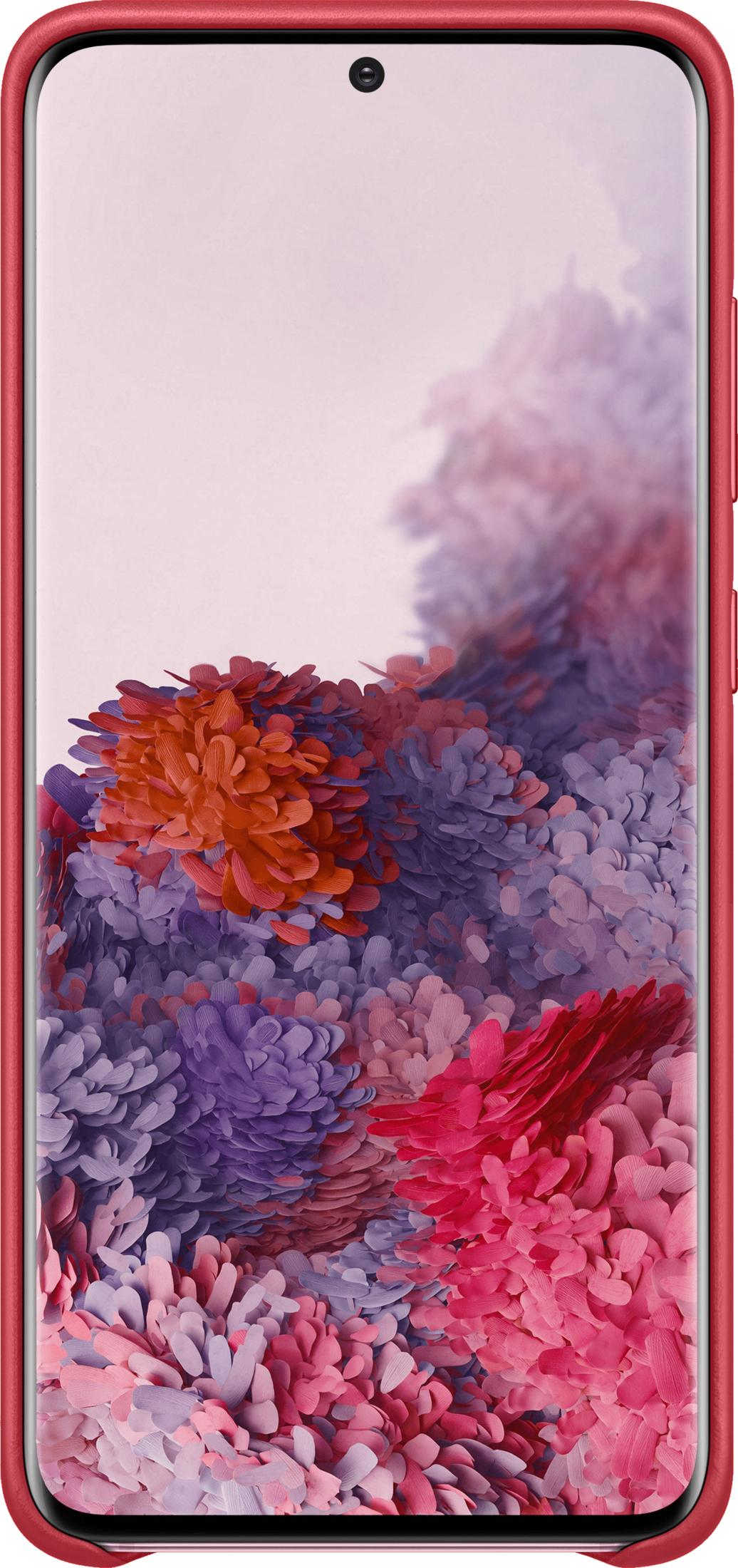 Un teléfono rojo con un fondo de pantalla de flores coloridas.
