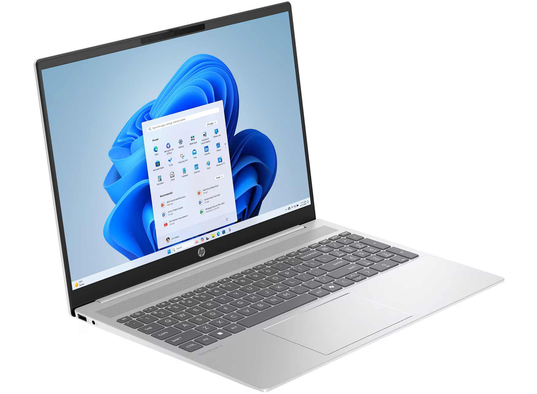 Srebrny laptop HP z otwartym menu Start Windows 11.