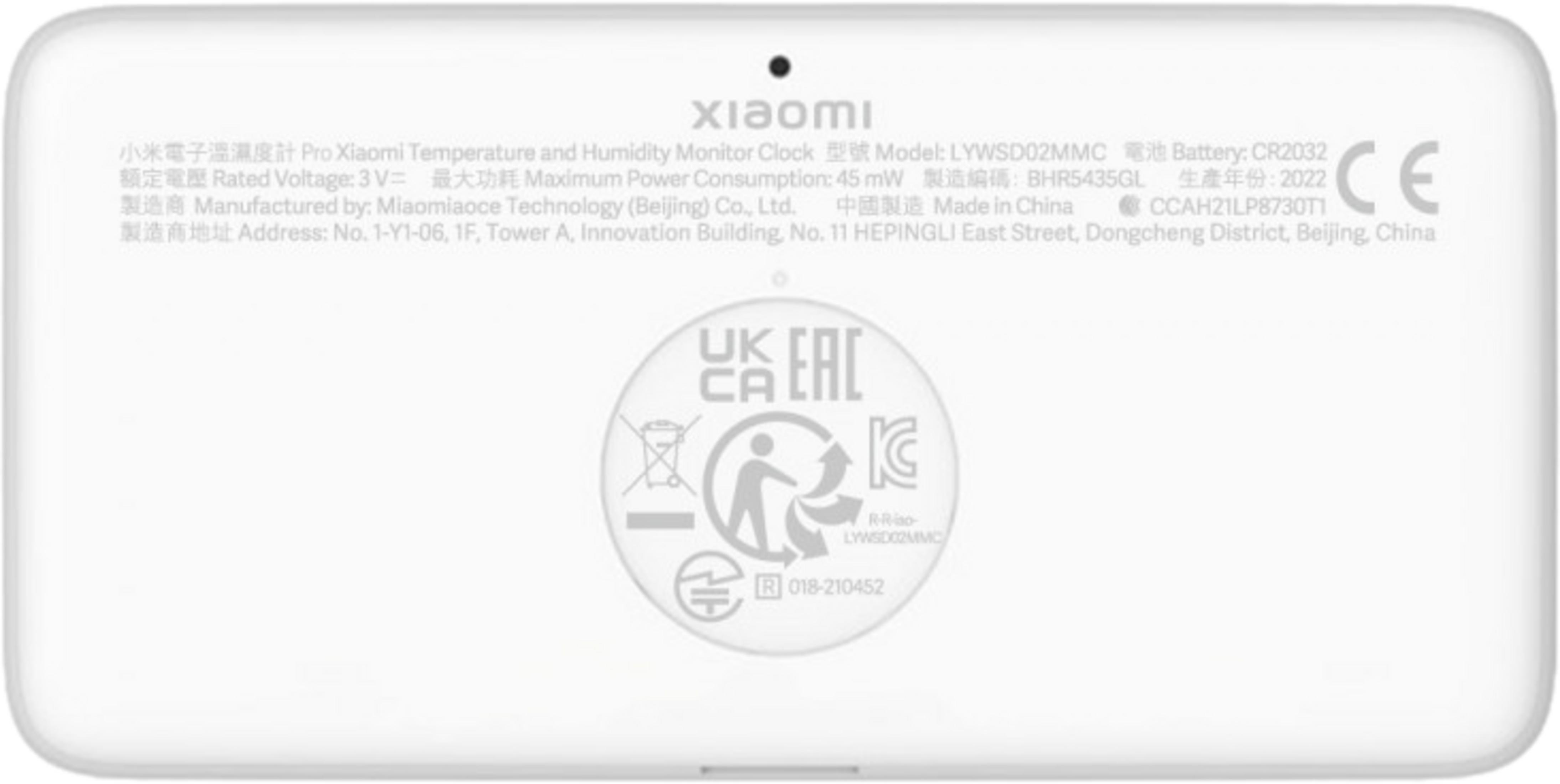 Biały tył monitora Xiaomi termometru/higrometru ze znakami CE i UKCA.