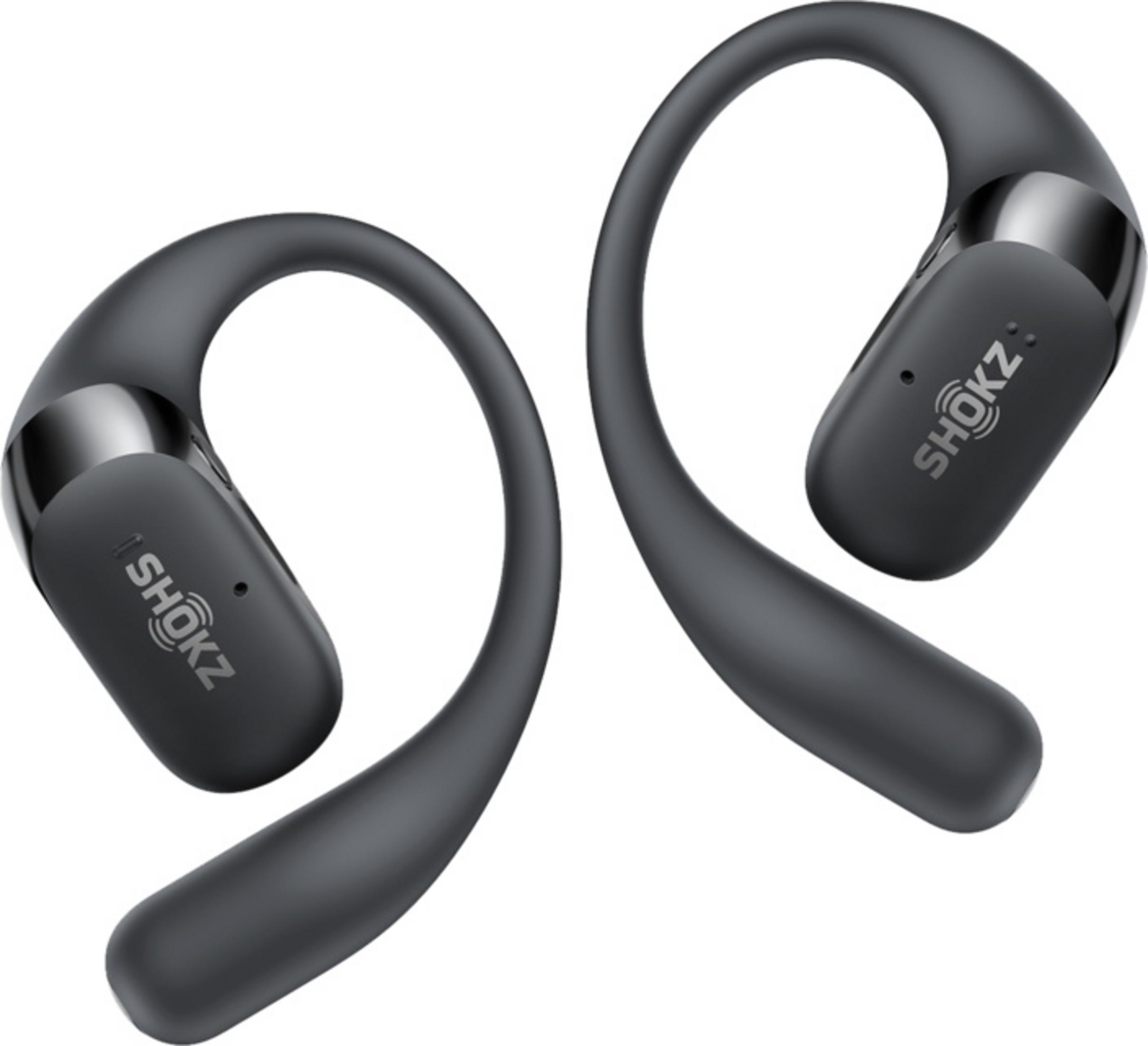 Zwei dunkle Shokz-Kopfhörer mit Bügeln, die über die Ohren gehen.