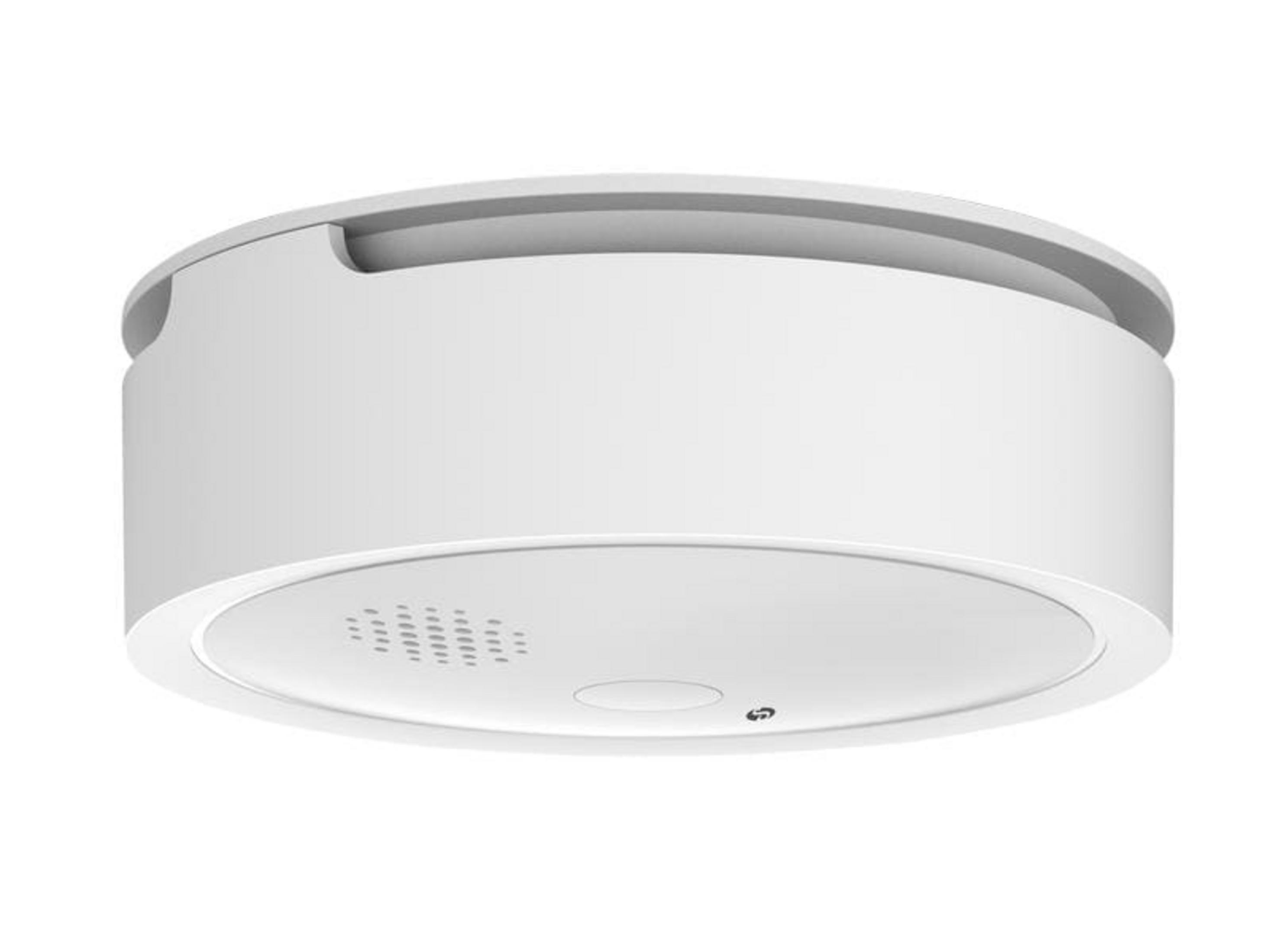 Biały, okrągły czujnik dymu z otworami wentylacyjnymi i przyciskiem.