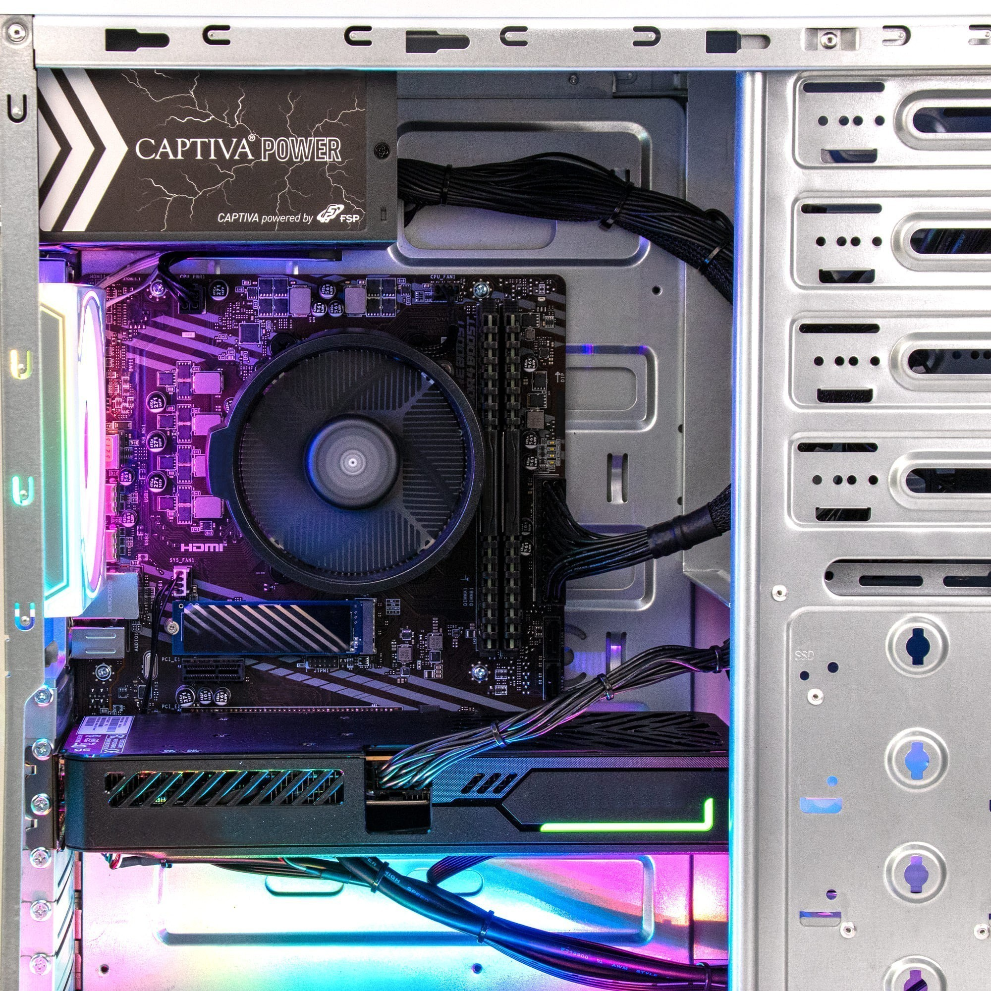 Un case PC aperto con illuminazione RGB, che mostra CPU, GPU e alimentatore.