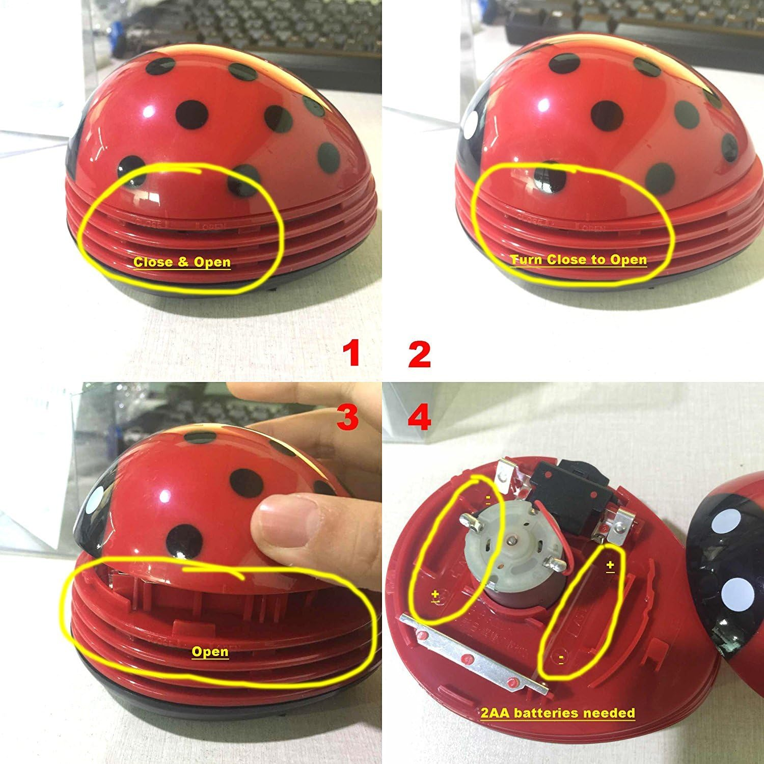 Roter Marienkäfer-Mini-Staubsauger, der geöffnet wird, um Batteriefach zu zeigen.