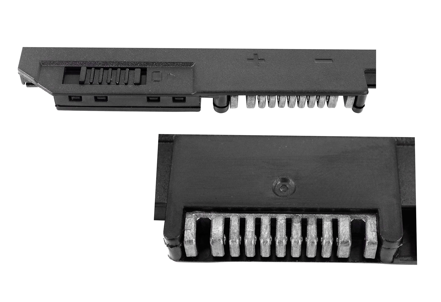 Nahaufnahme eines schwarzen Laptop-Akkusteckers mit Metallstiften.