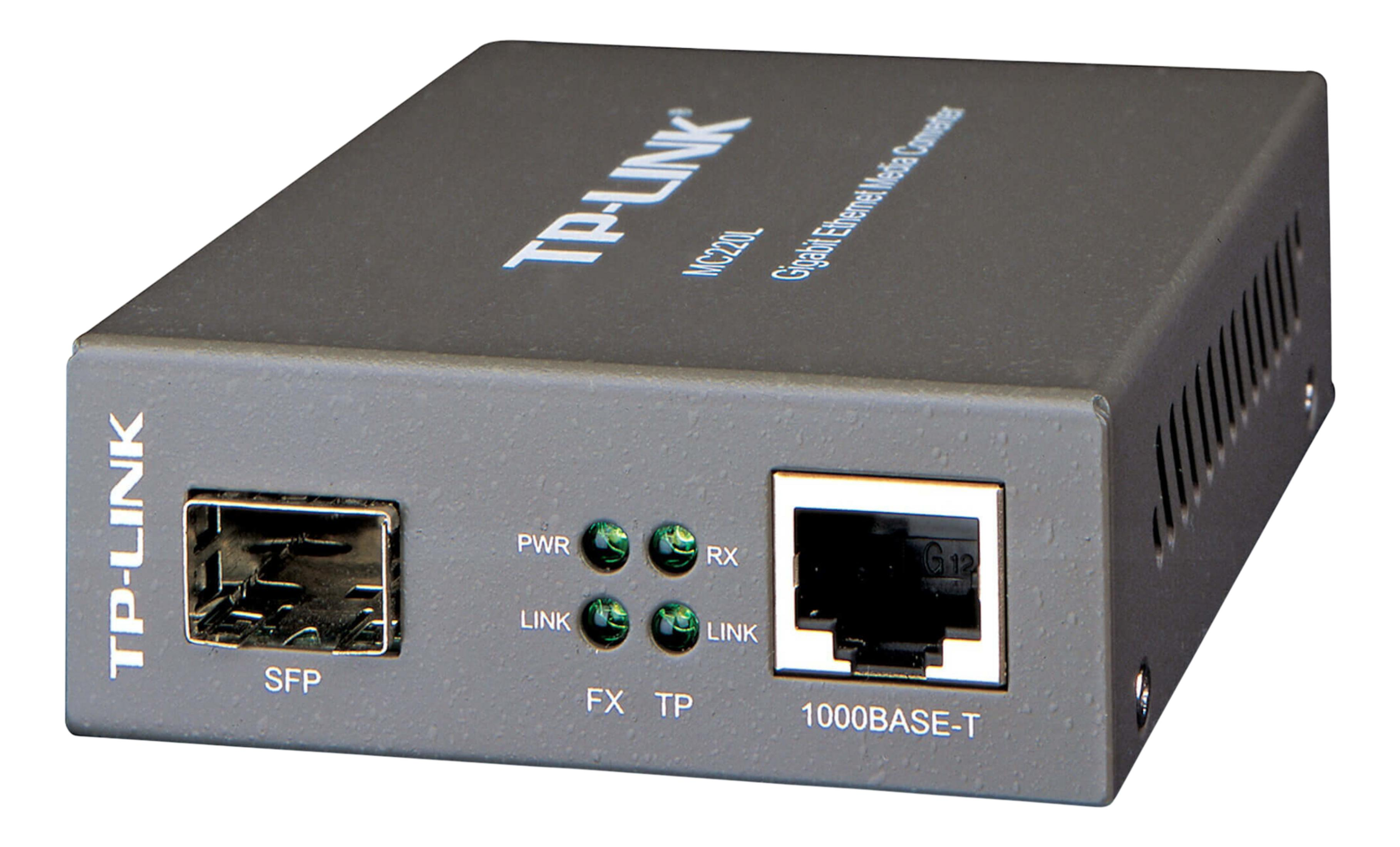 SFP ve RJ45 bağlantı noktalarına sahip gri bir TP-Link MC220L Gigabit Ethernet medya dönüştürücü.