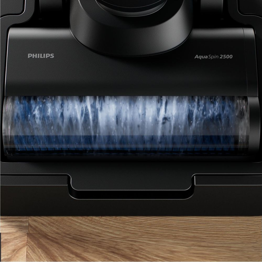 Zbliżenie na czarną szczotkę podłogową Philips AquaSpin 2500 z niebieskim włosiem.