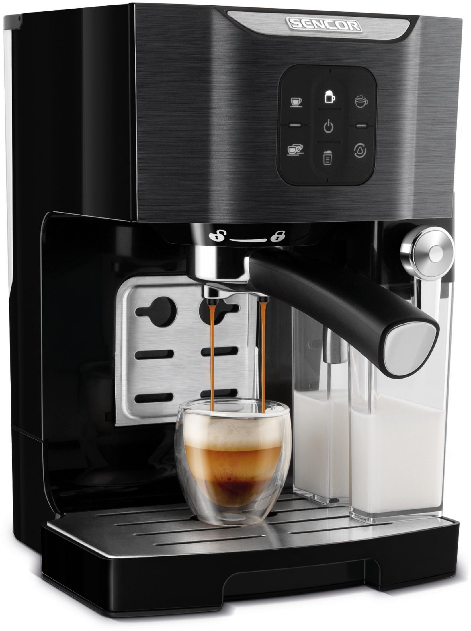 Eine schwarze Espressomaschine brüht Kaffee in ein Glas, daneben ein Milchbehälter.