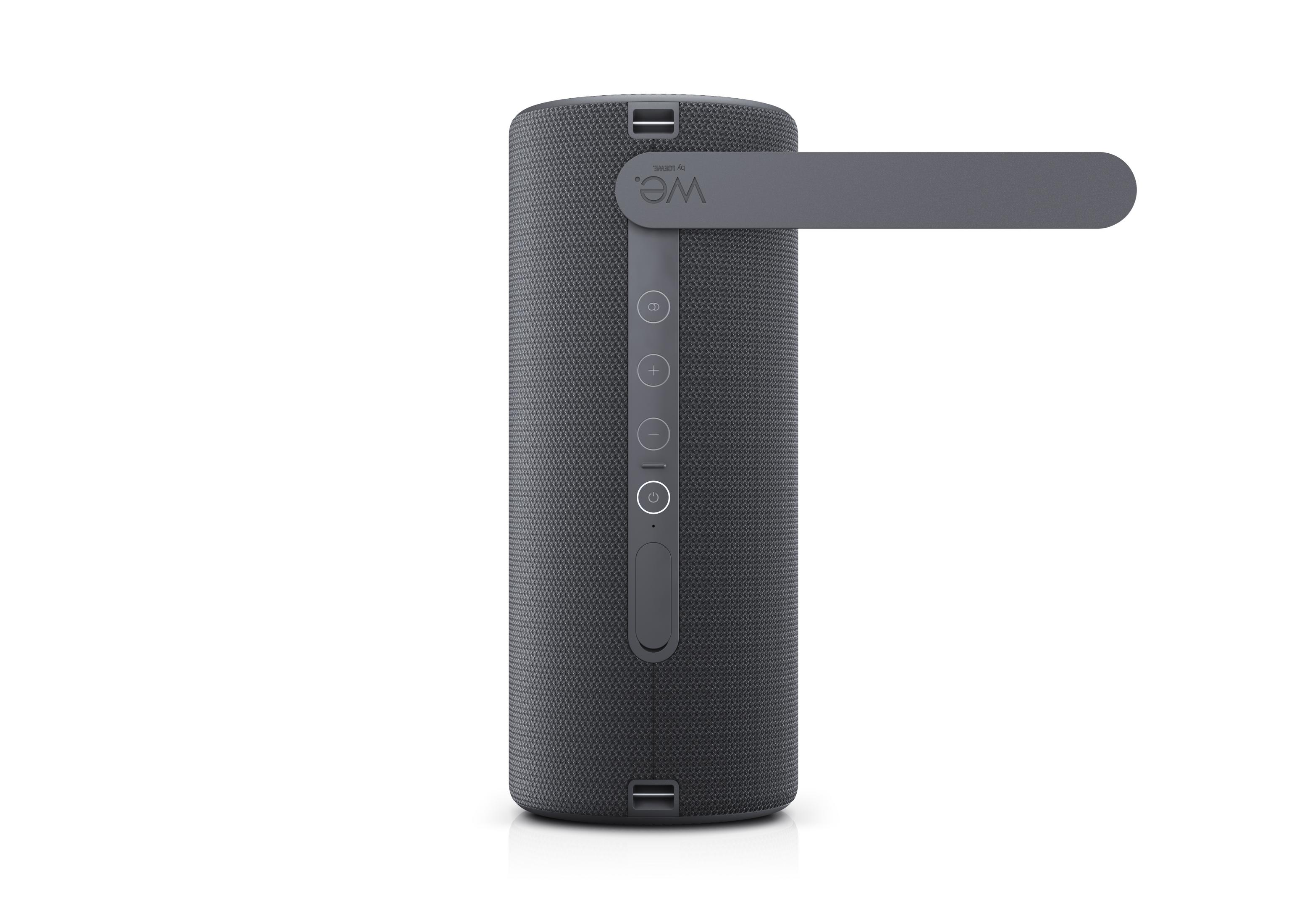Grauer Bluetooth-Lautsprecher mit Tragegriff und Bedienelementen.