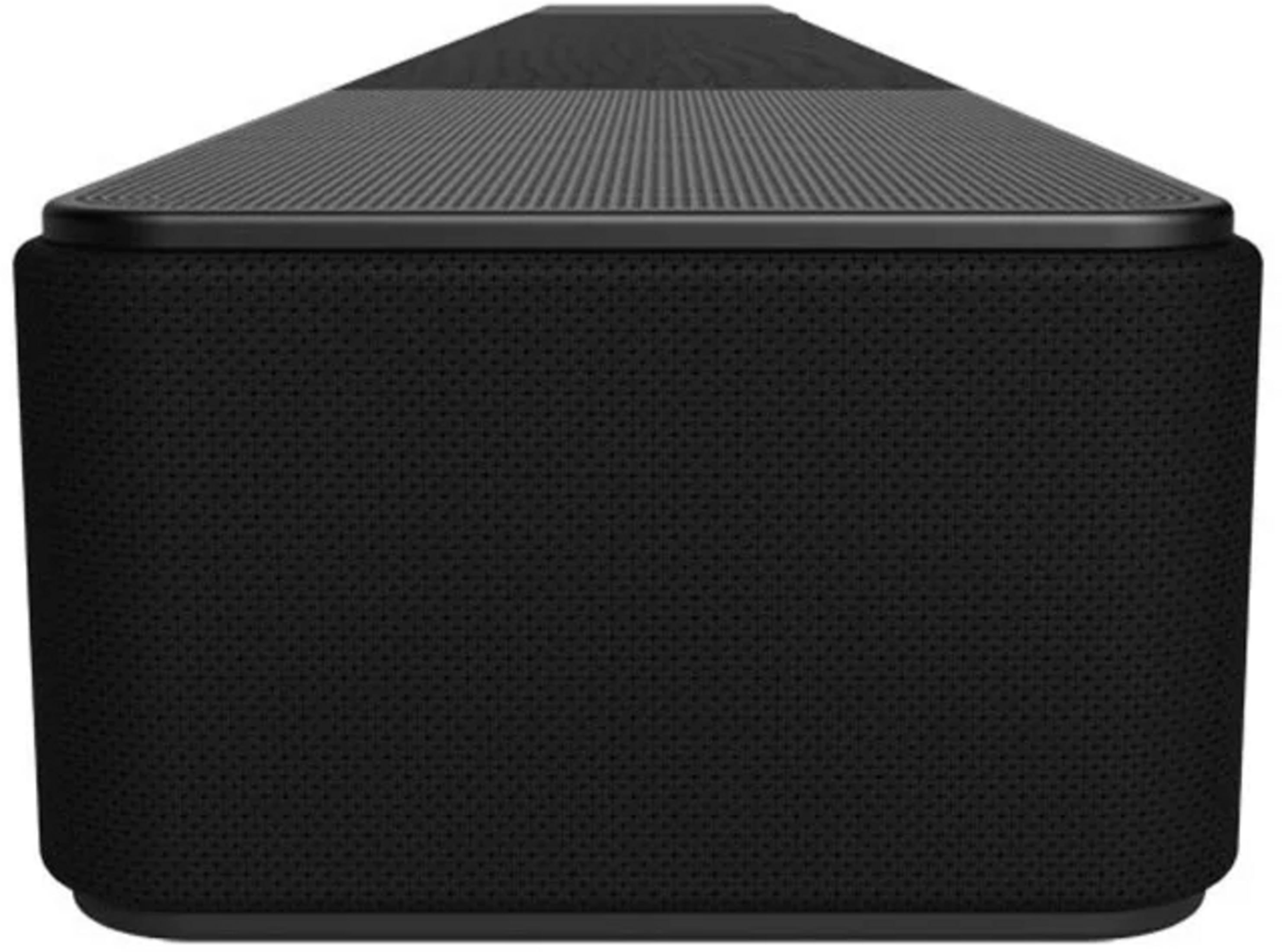 Czarny, prostokątny głośnik z rowkowaną górną powierzchnią.