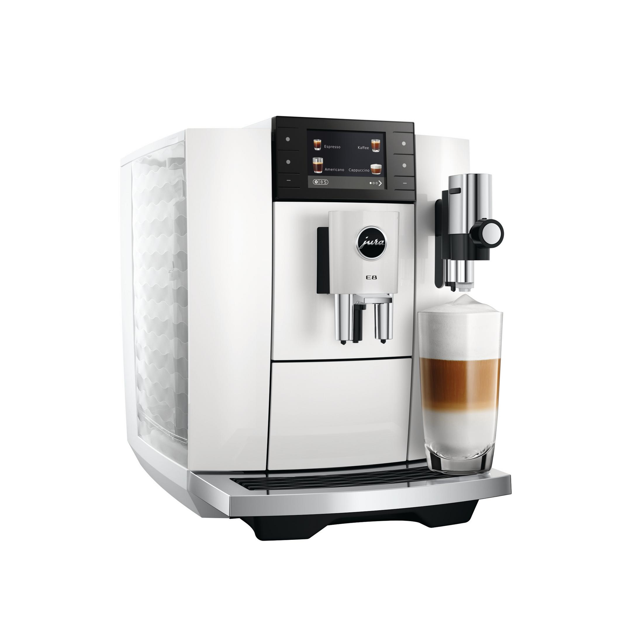 Macchina da caffè Jura bianca con touchscreen e bicchiere di latte macchiato.