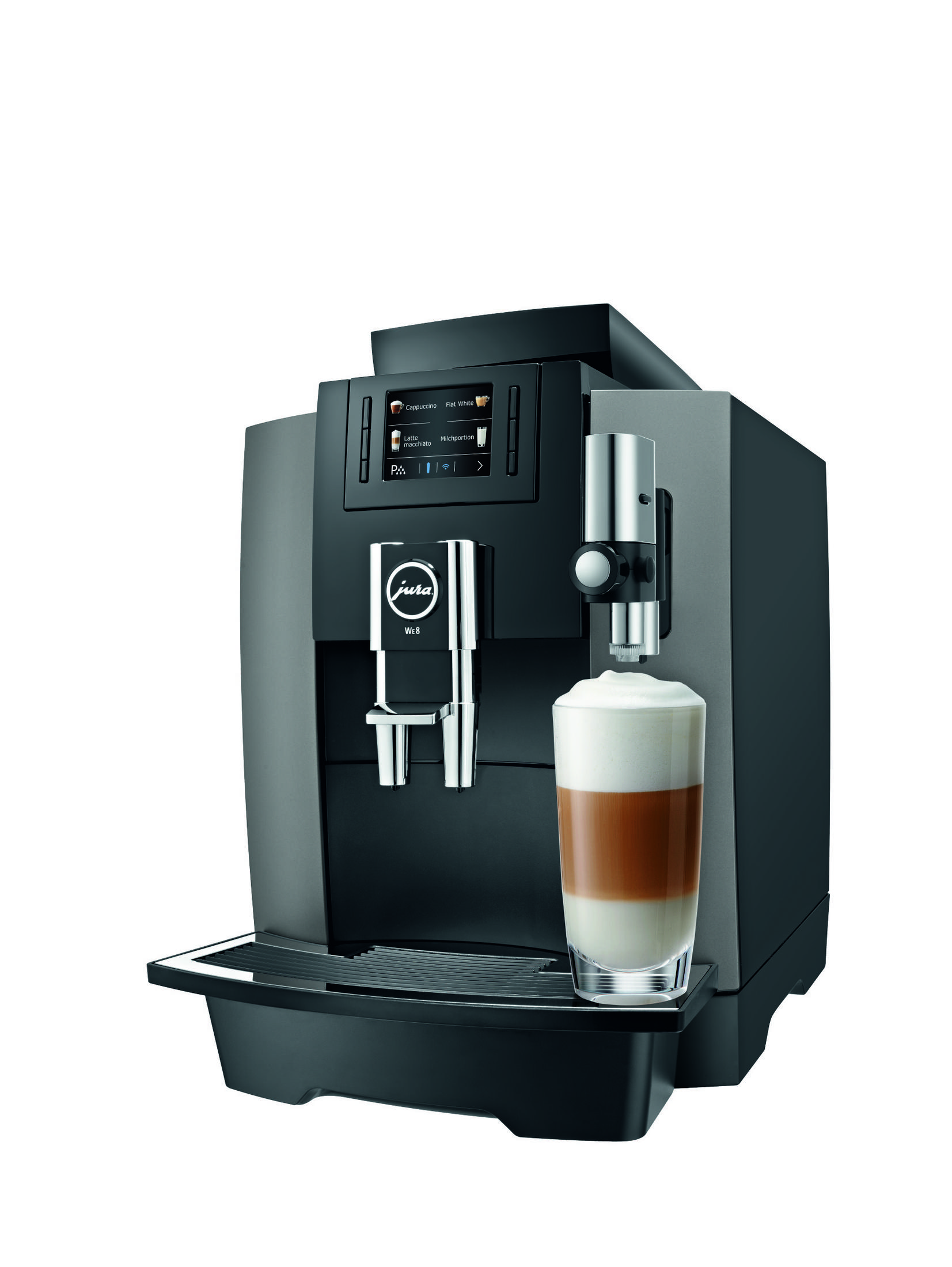 Eine Kaffeemaschine bereitet einen geschichteten Latte Macchiato in einem Glas zu.