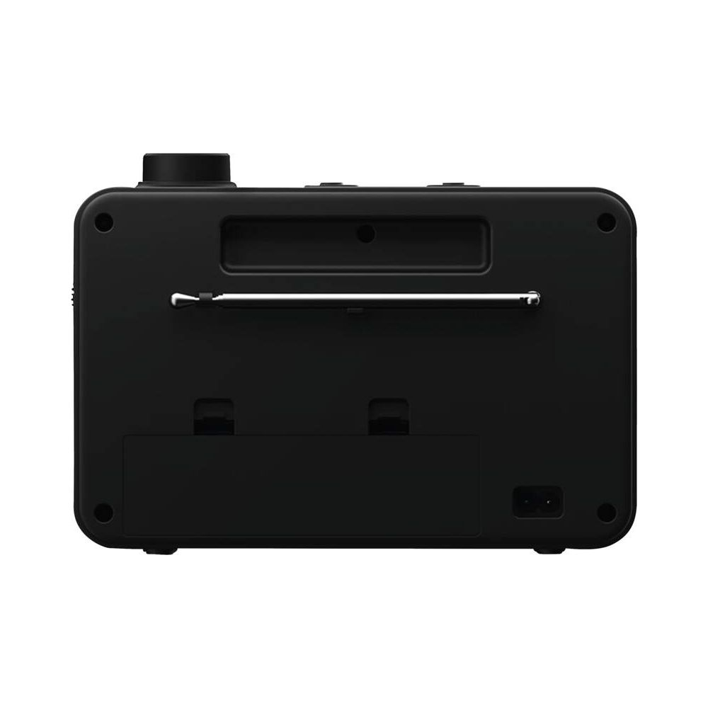 Tył czarnego radia z wysuniętą anteną i złączem zasilania.