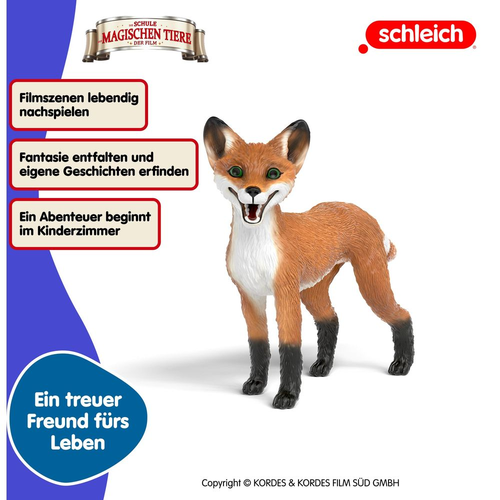 Zabawkowy lis z zielonymi oczami stoi na niebieskim tle.