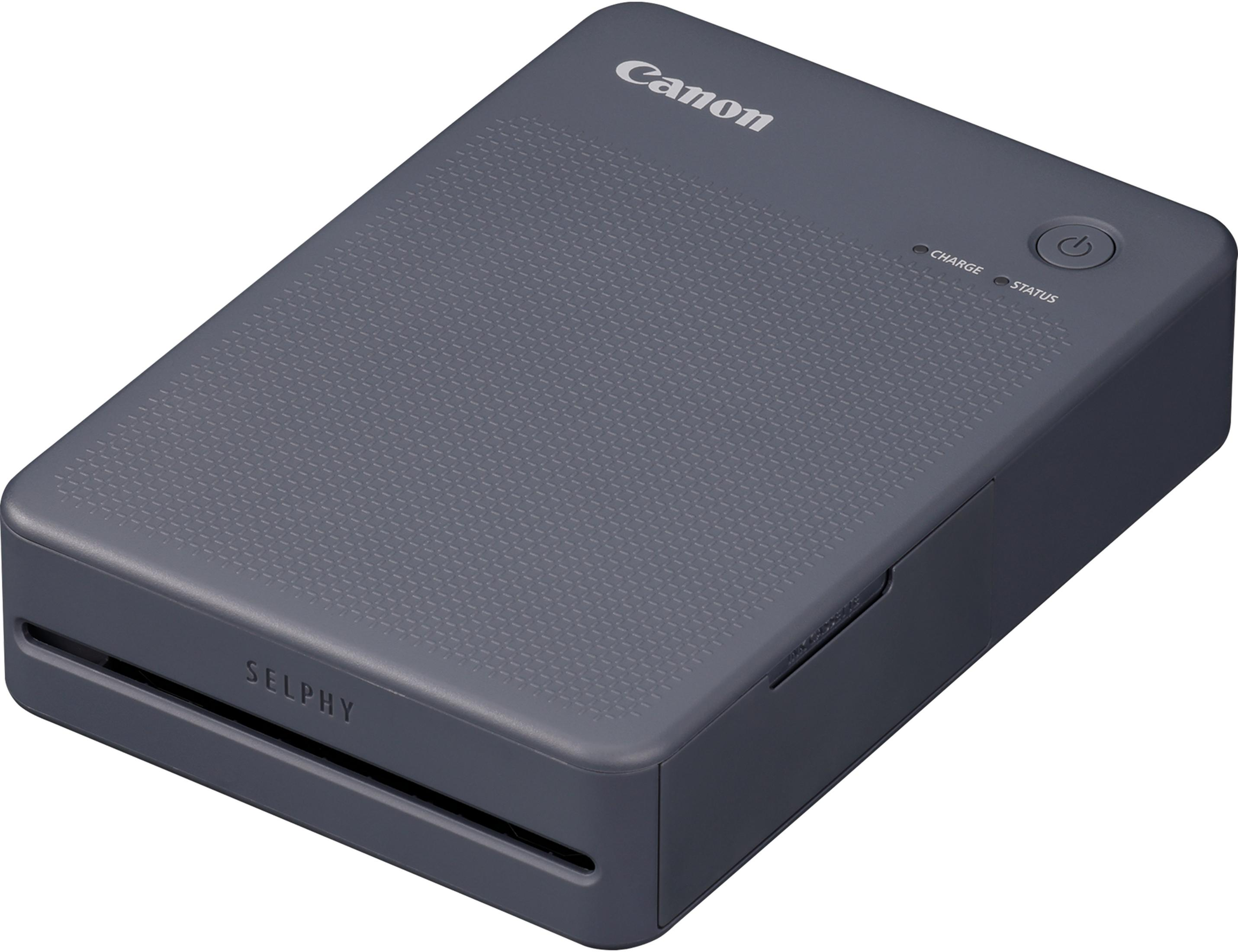 Stampante Canon Selphy grigio scuro con pulsante di accensione e indicatori.