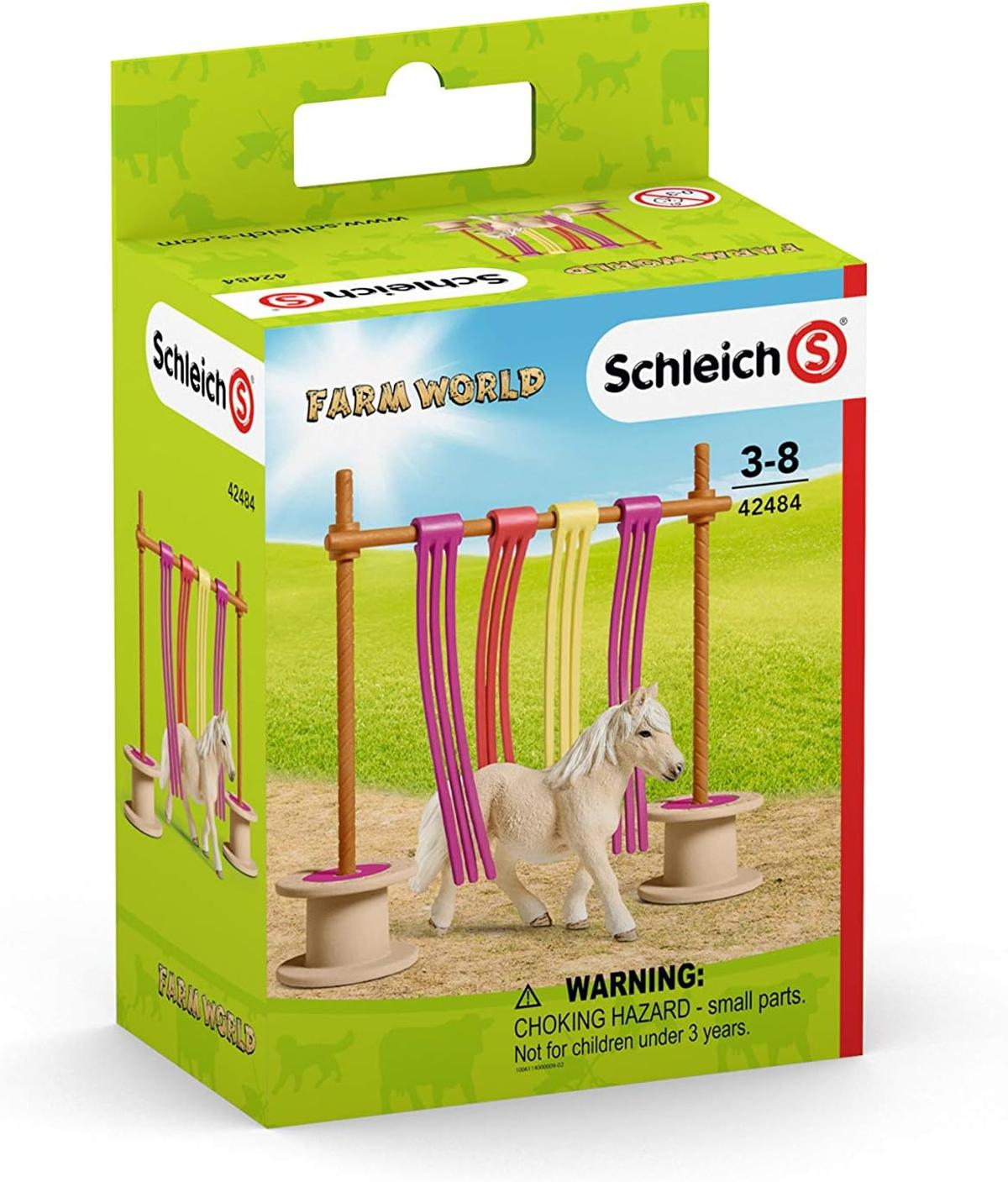 Zestaw zabawek Schleich Farm World z dwoma końmi i kolorowymi wstążkami.