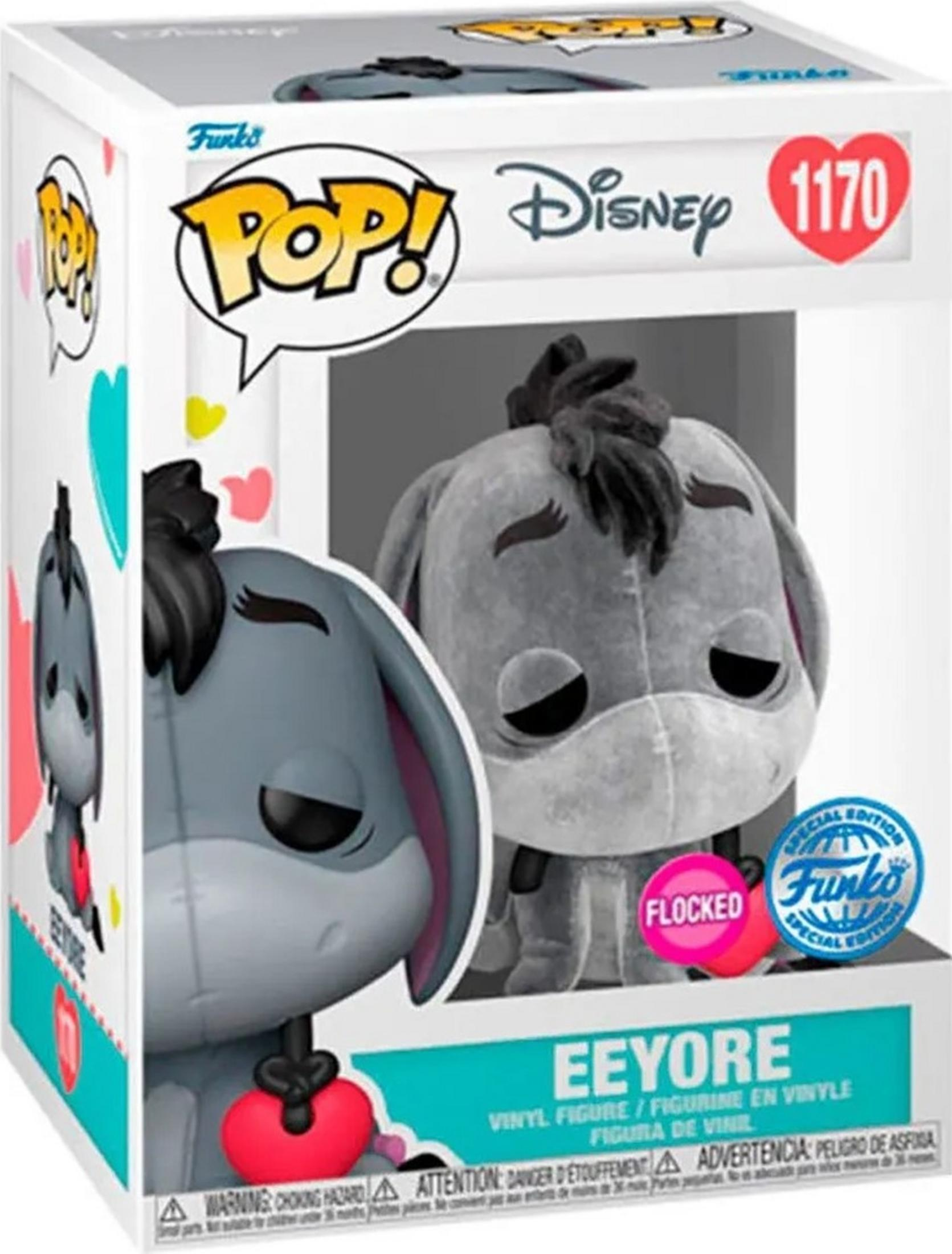 Scatola Funko Pop! con una figura di Eeyore che tiene un ciondolo a forma di cuore rosso.