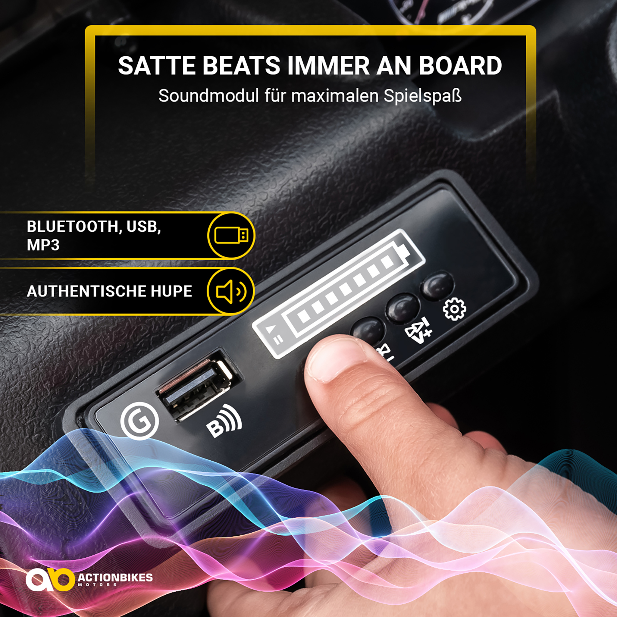 Ein Finger drückt auf ein Bedienfeld mit USB, MP3, Bluetooth und Hupe.