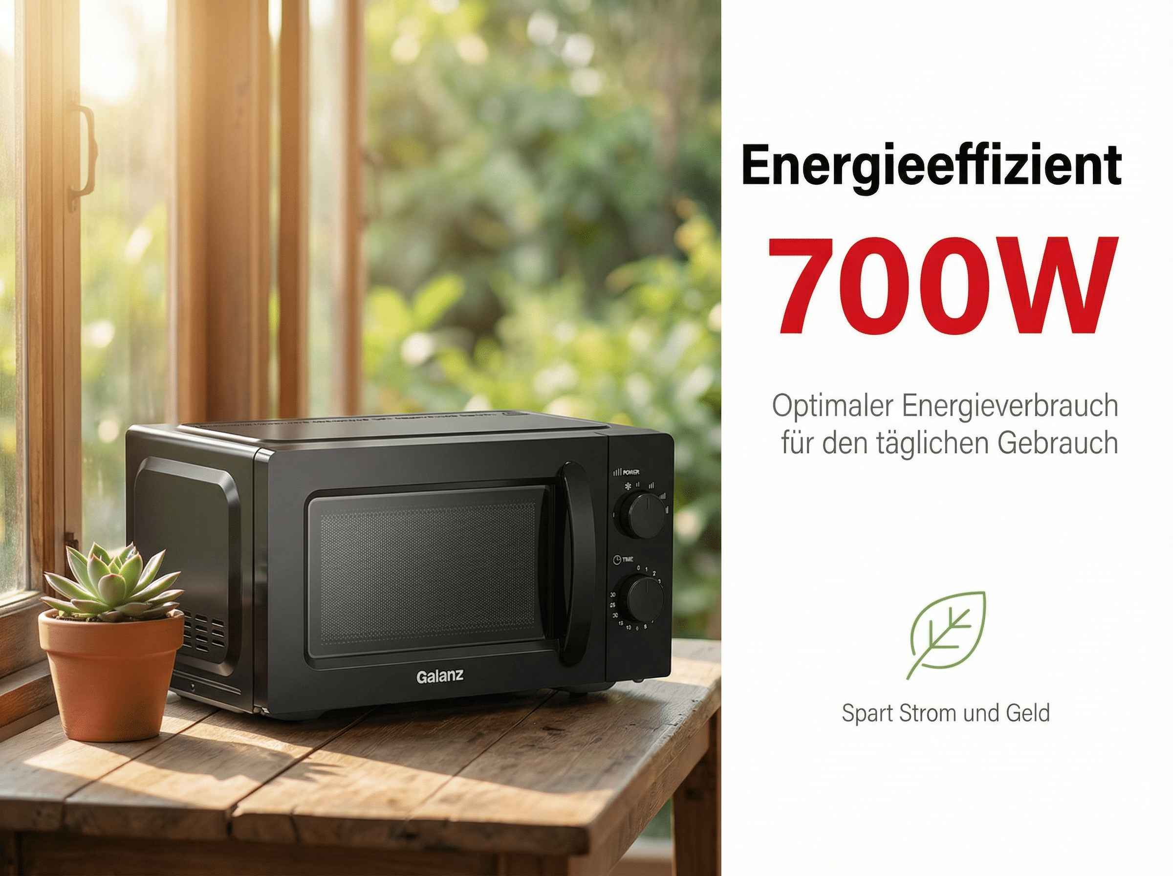 Schwarze Galanz Mikrowelle auf Holztisch, neben Pflanze. Energieeffizient 700W.