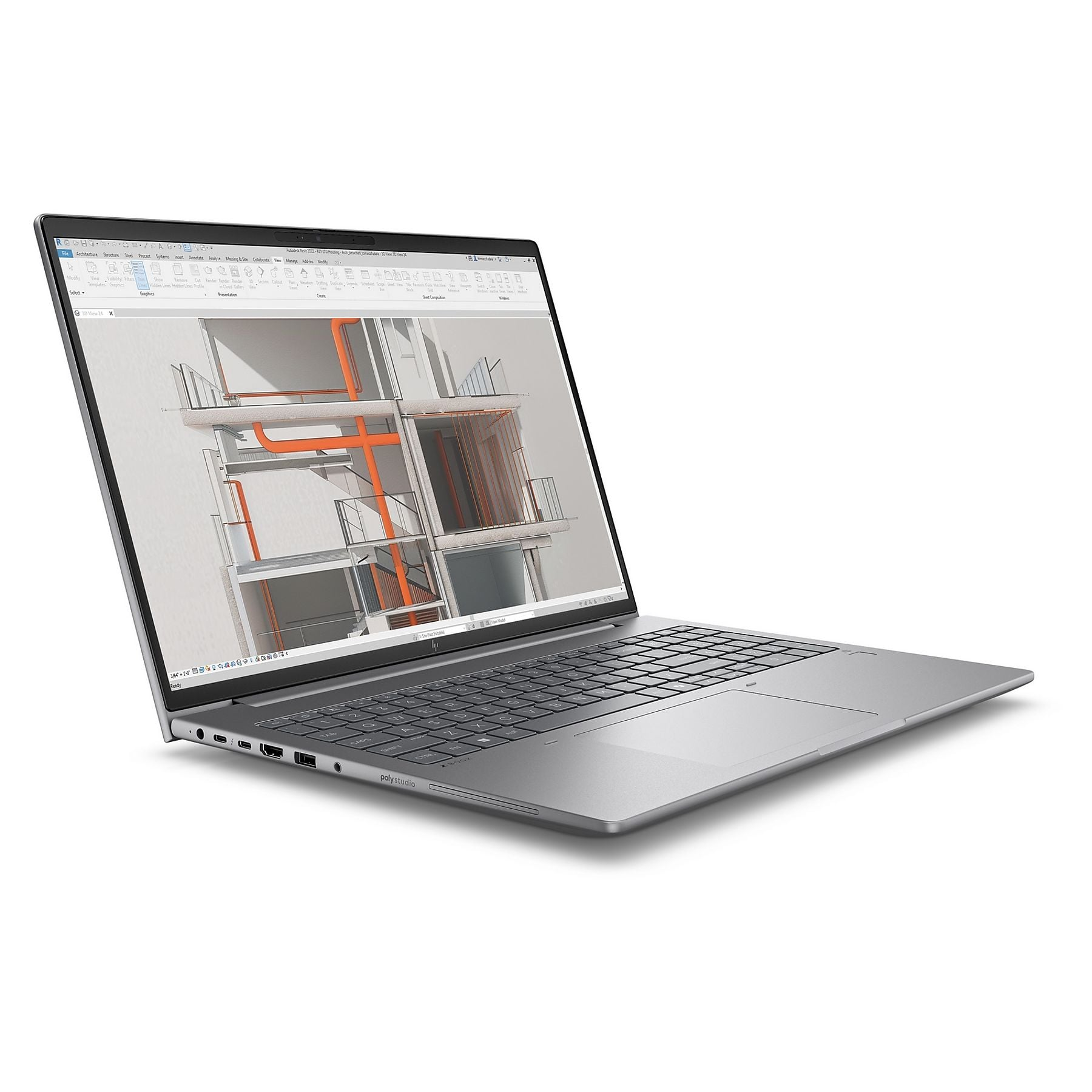 Un laptop argento mostra un modello 3D di edificio con tubi arancioni.