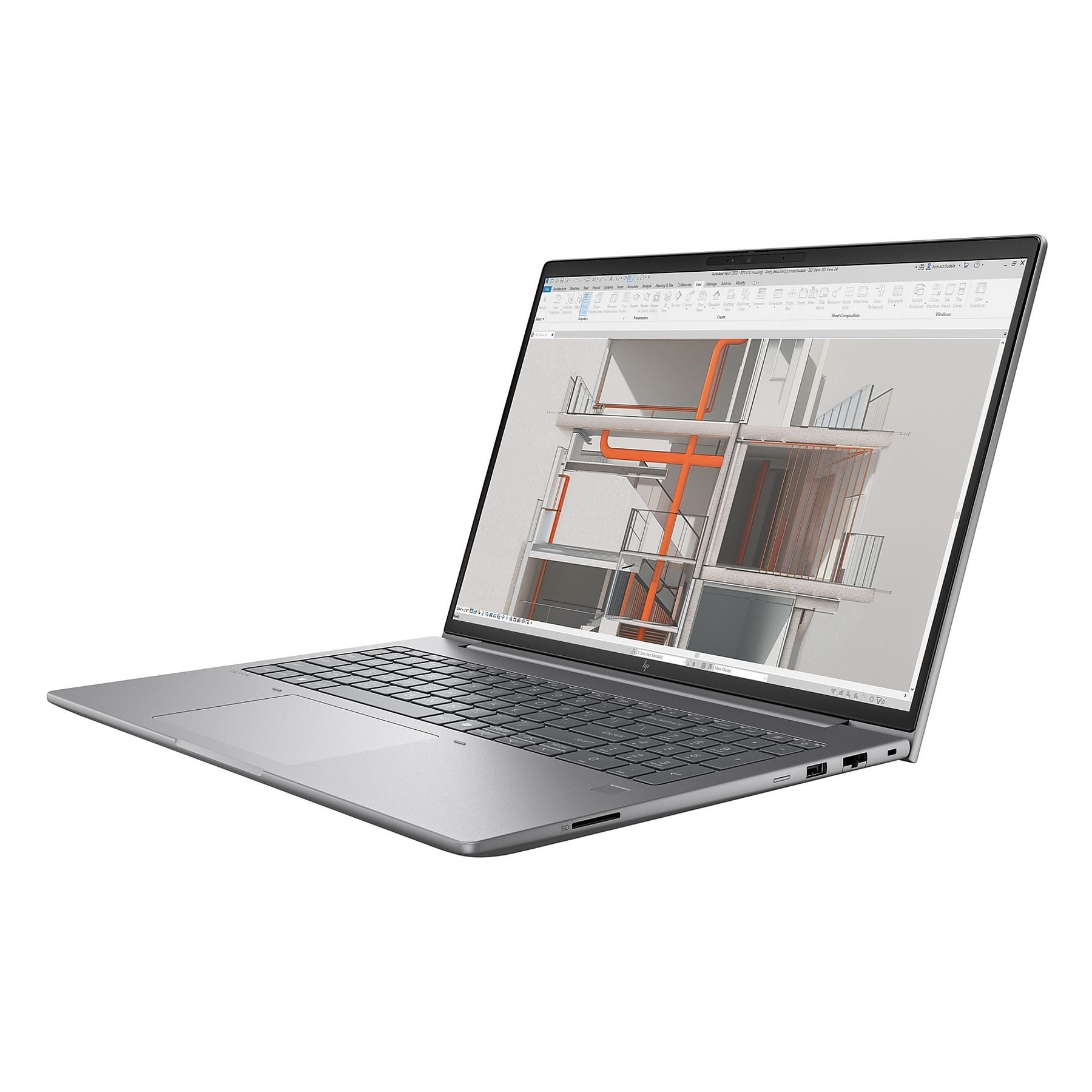 Un laptop argentato che mostra un modello 3D di edificio sullo schermo.
