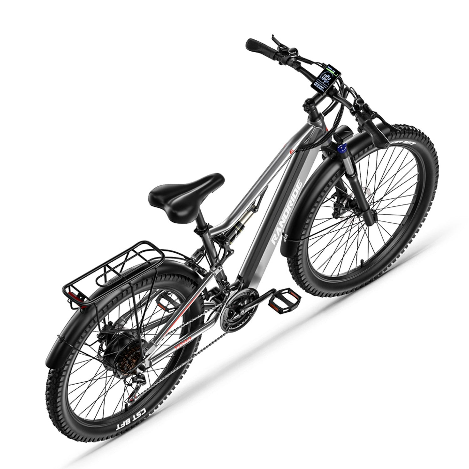 Una bicicleta eléctrica de montaña gris con neumáticos anchos y portaequipajes trasero.