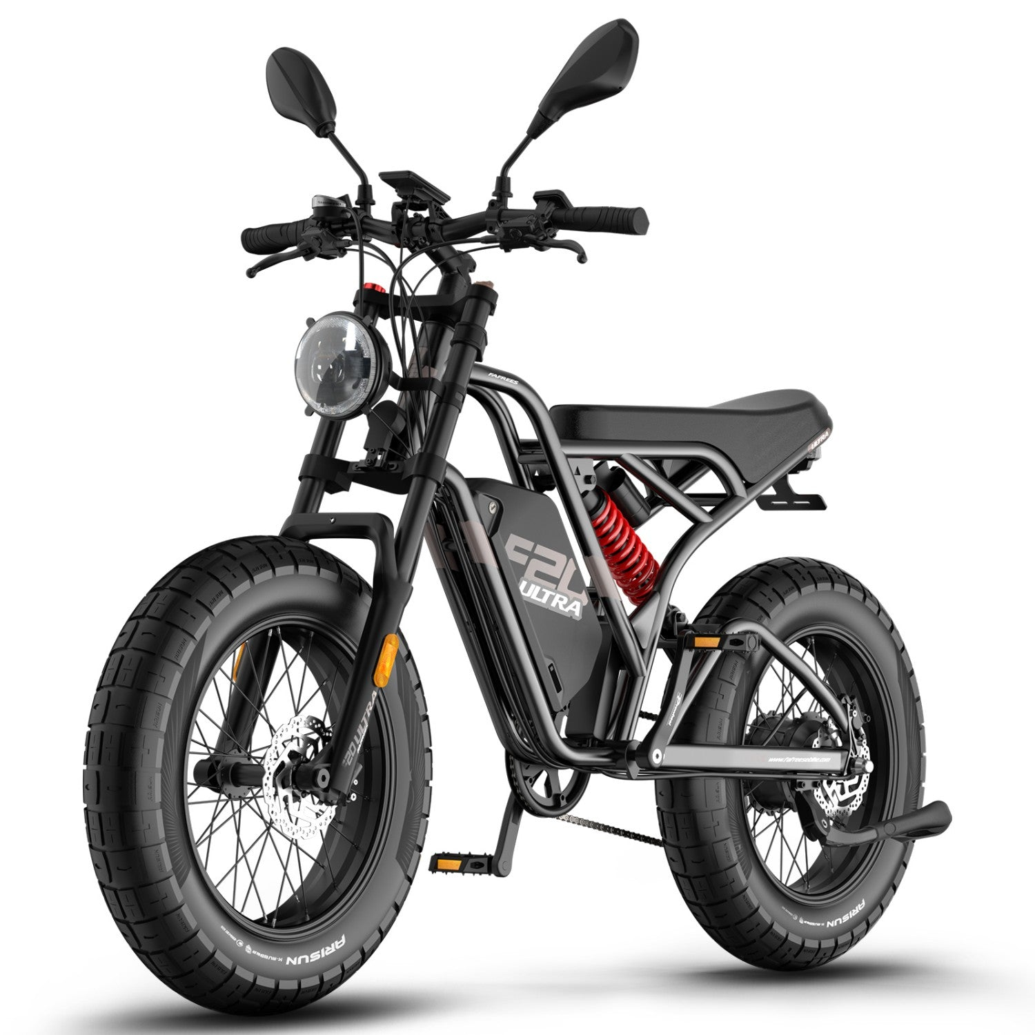 Bicicleta eléctrica negra con neumáticos anchos, amortiguador rojo y faros redondos.