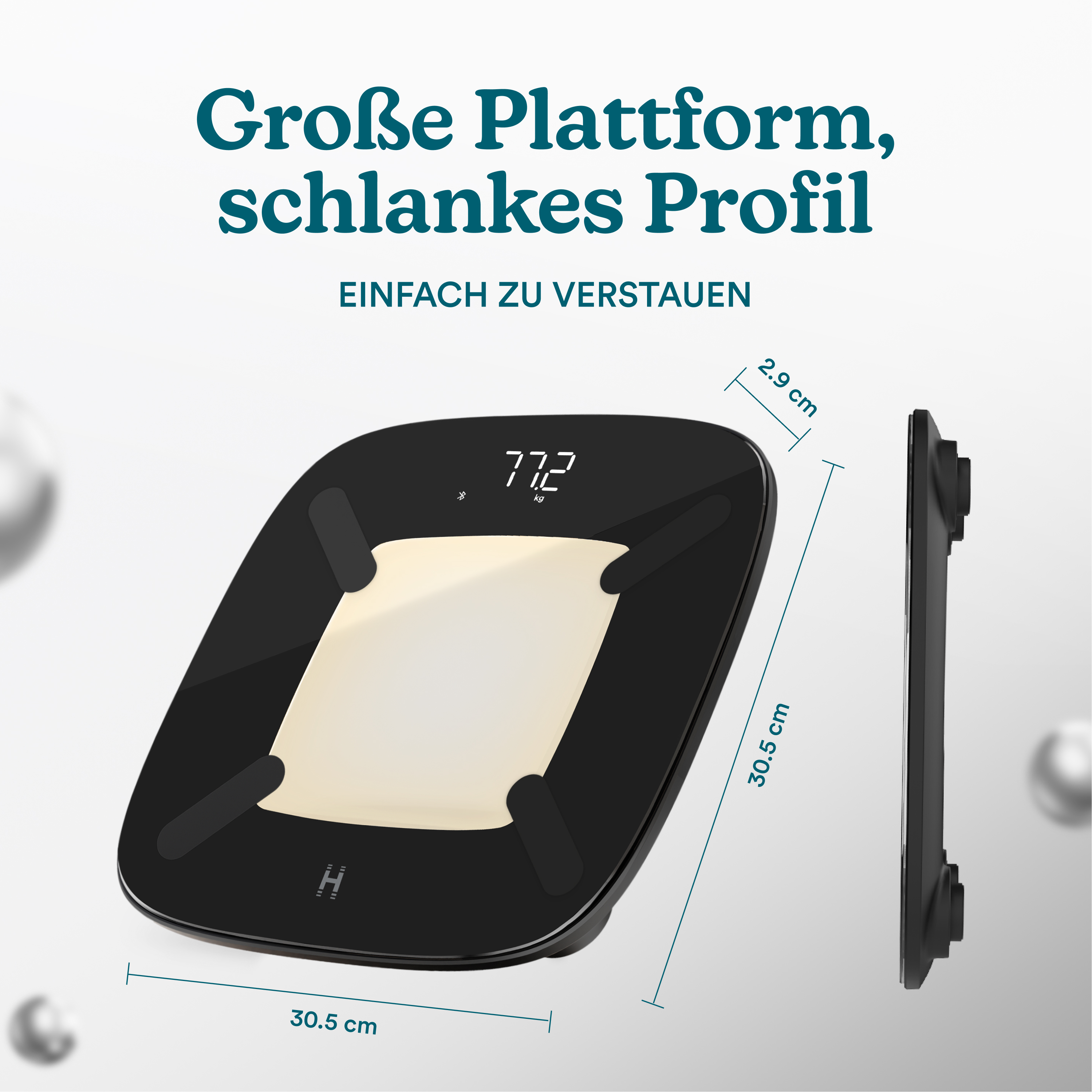 Czarna waga z jasnym wyświetlaczem, wymiary 30.5x30.5 cm, wysokość 2.9 cm.