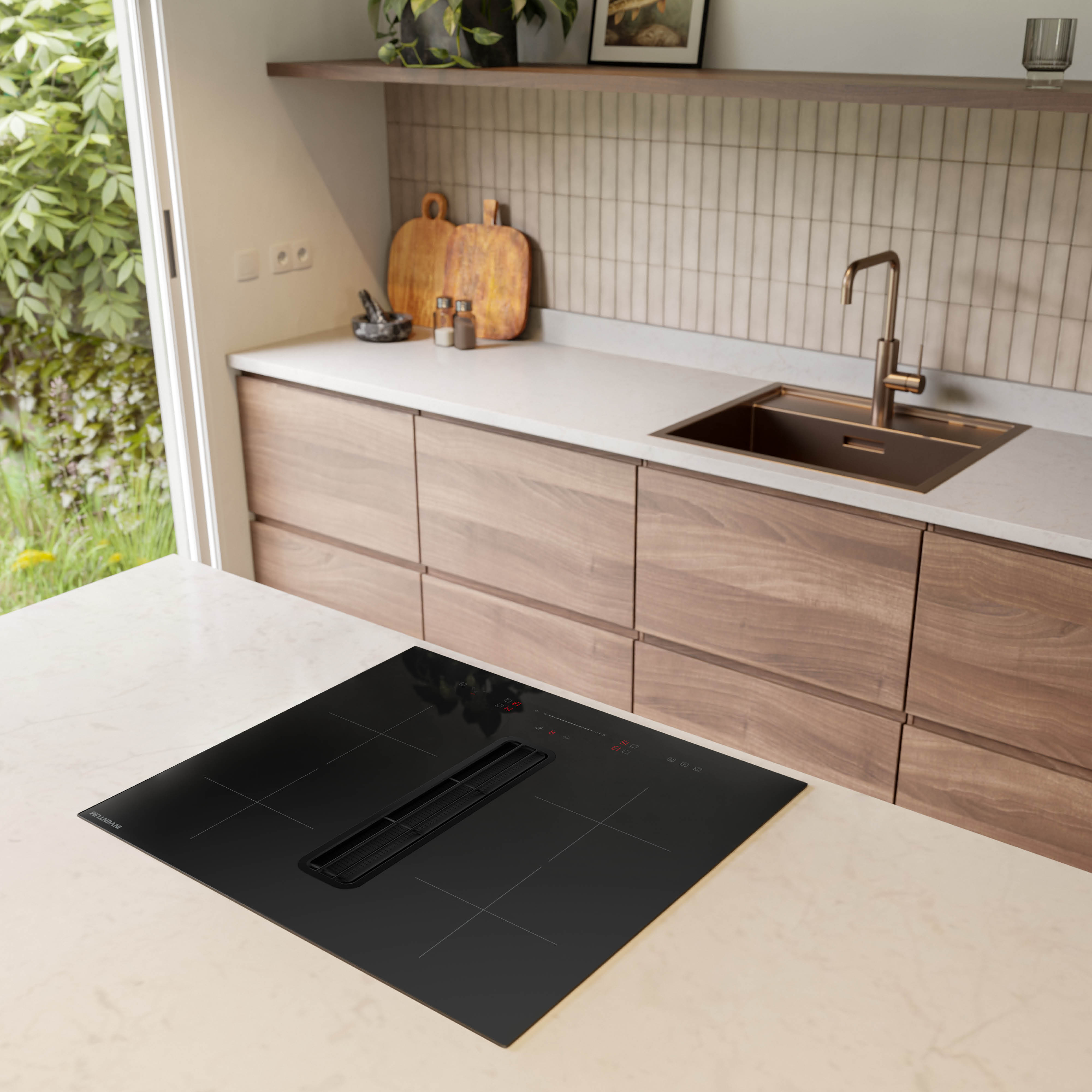 Modern kitchen with black induction hob, wooden cabinets, copper tap, and greenery.