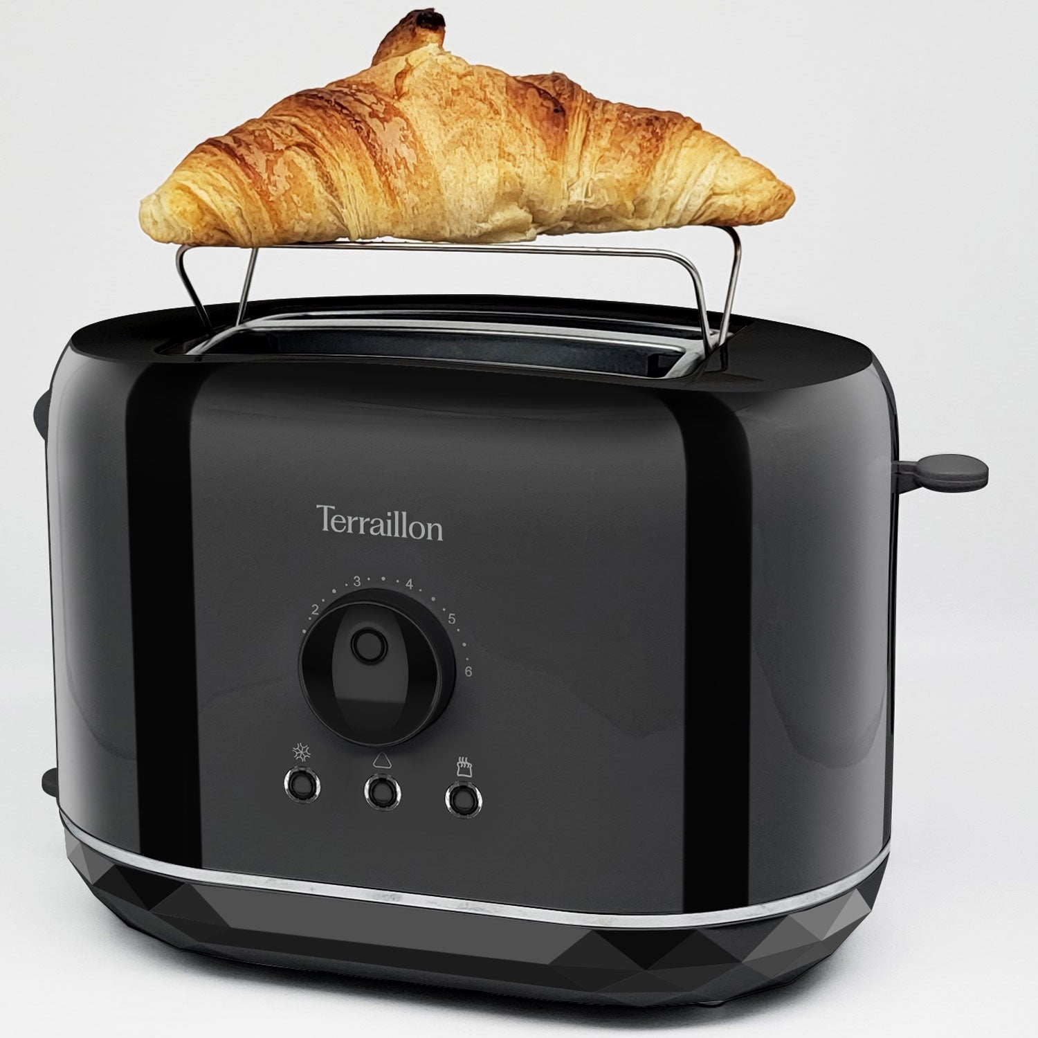 Een zwarte broodrooster met een croissant op het bovenste rek.