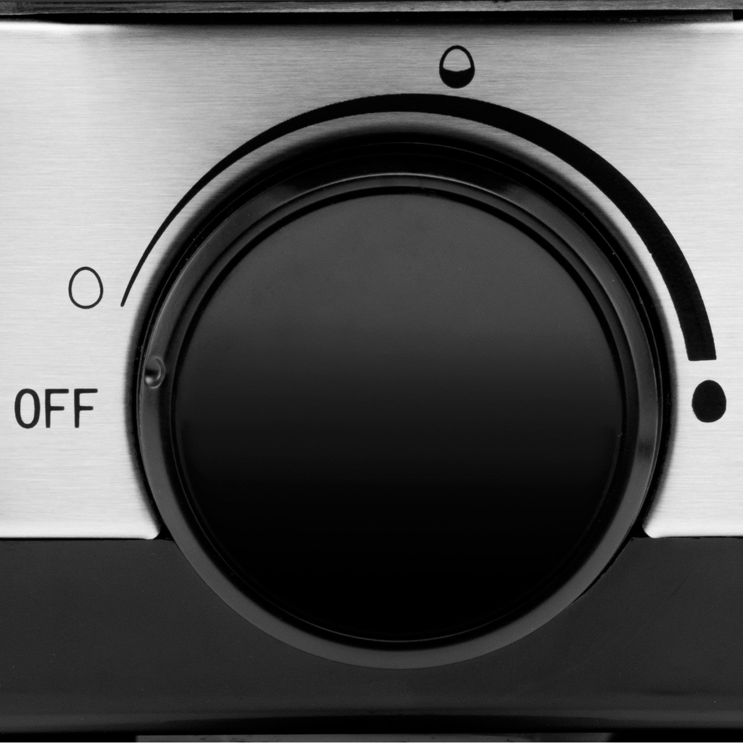 A large black dial on brushed metal with the word "OFF".