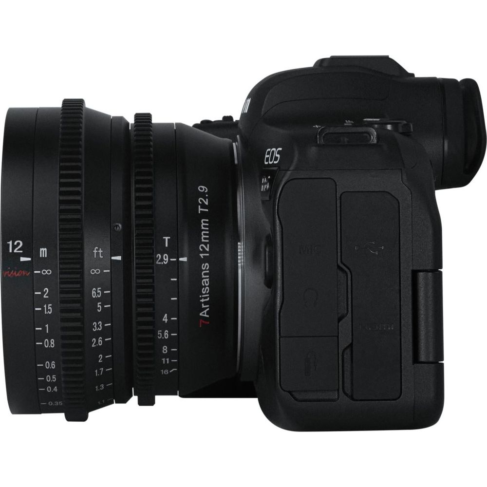 Black EOS camera with 7Artisans 12mm T2.9 lens, showing focus and aperture markings.