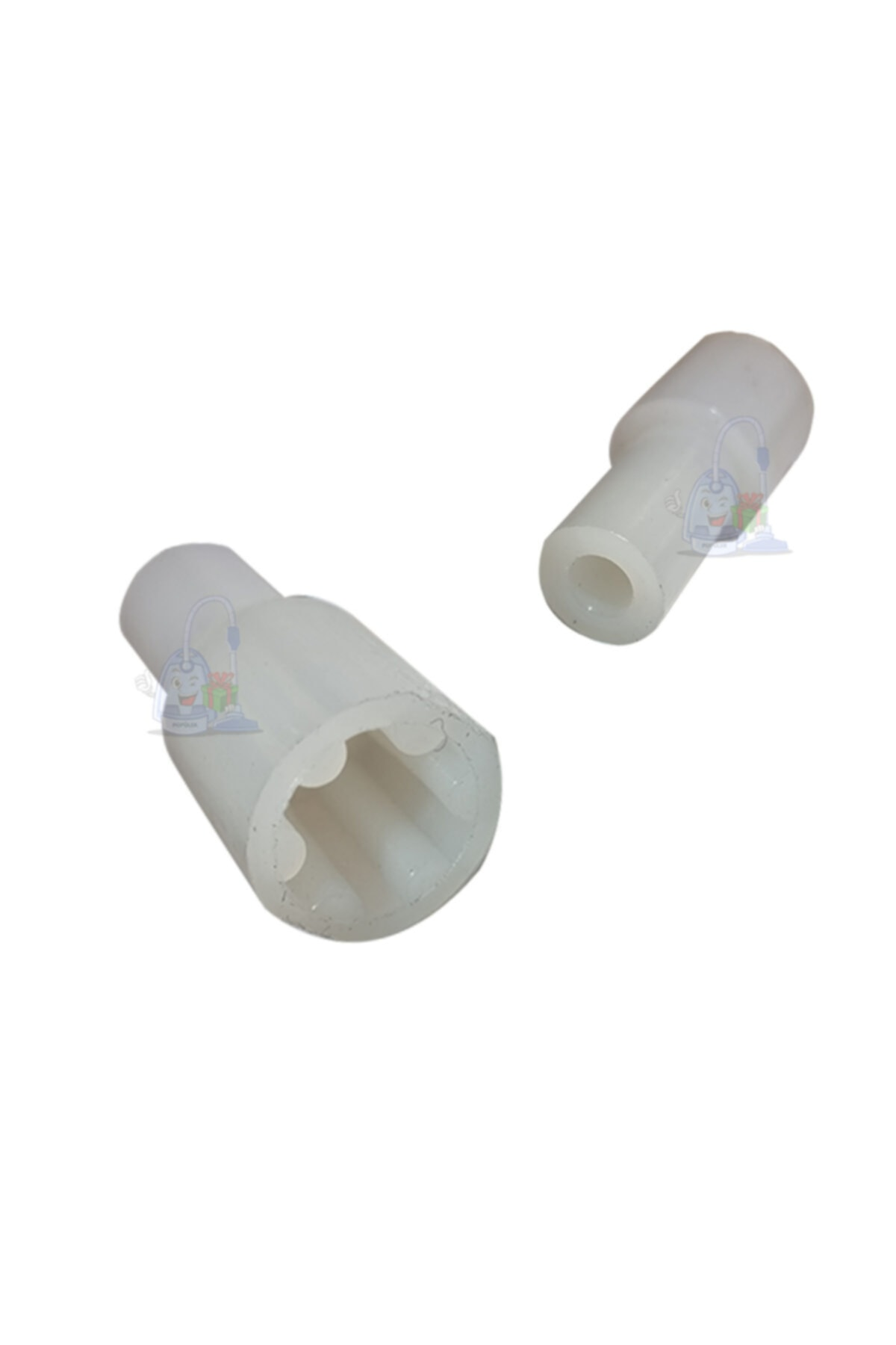 İki beyaz plastik parça, kısa bir tüp ve konik uçlu daha uzun bir tüp.