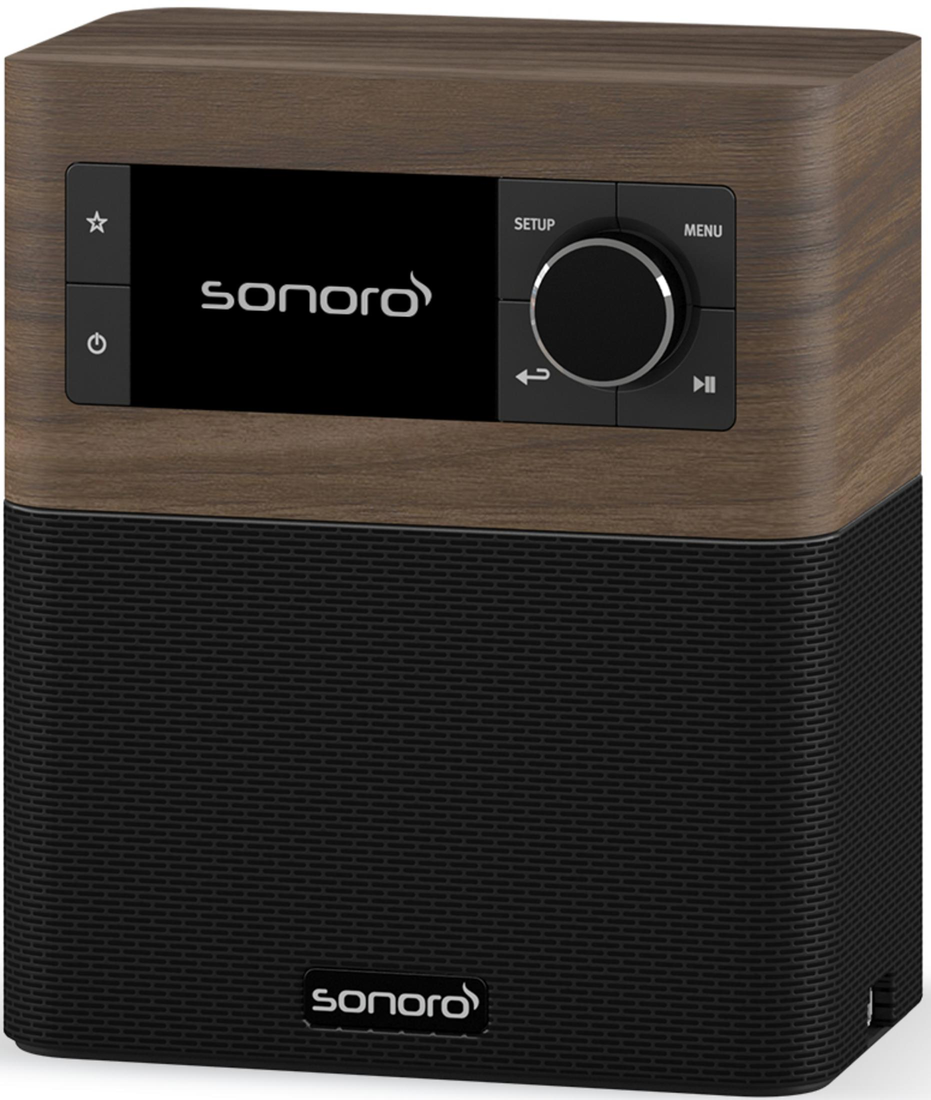 Ein Holzmaser-Radio mit schwarzem Lautsprechergitter und Bedienfeld.