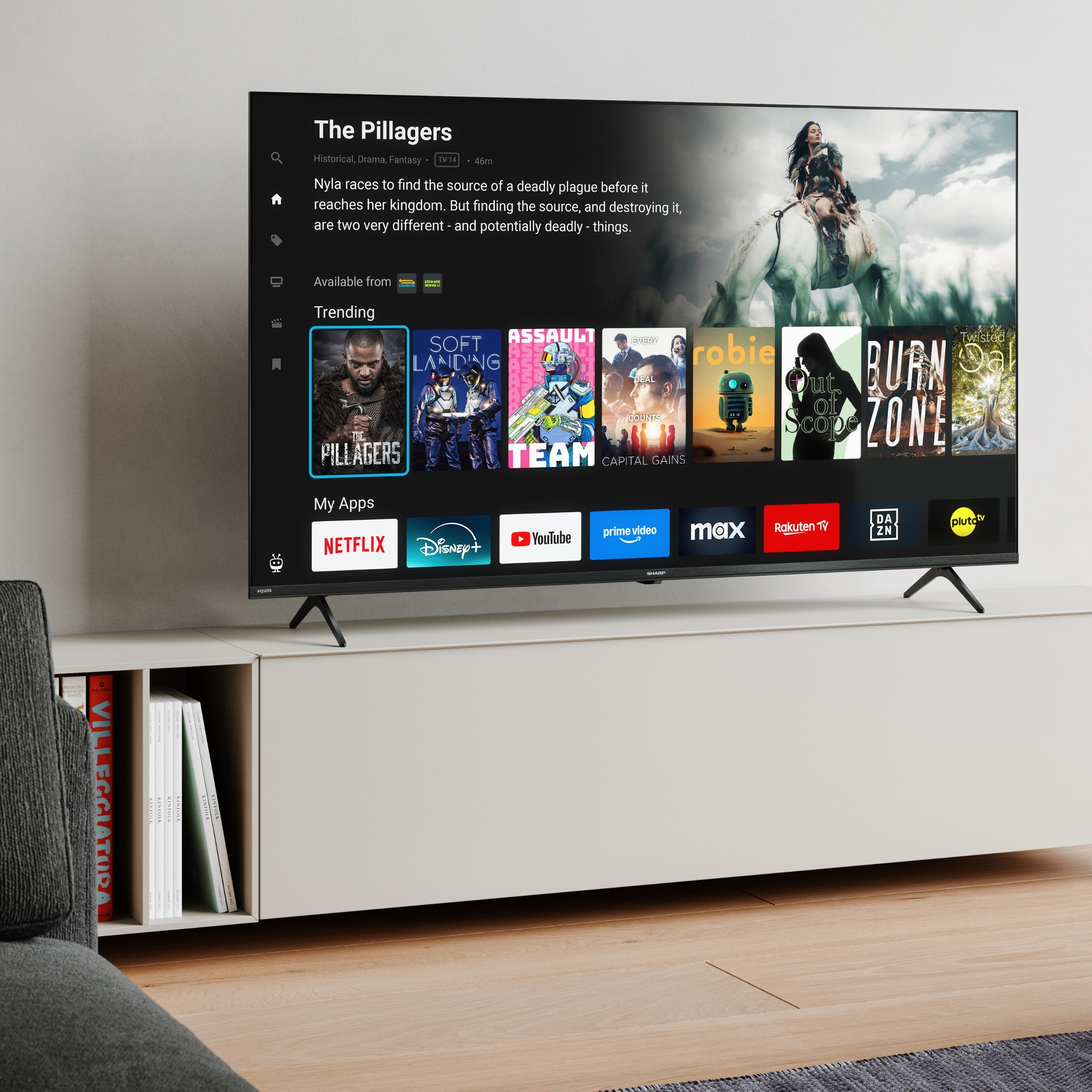 Ein Fernsehbildschirm zeigt die „The Pillagers“-App mit Film-Thumbnails und Streaming-Diensten.