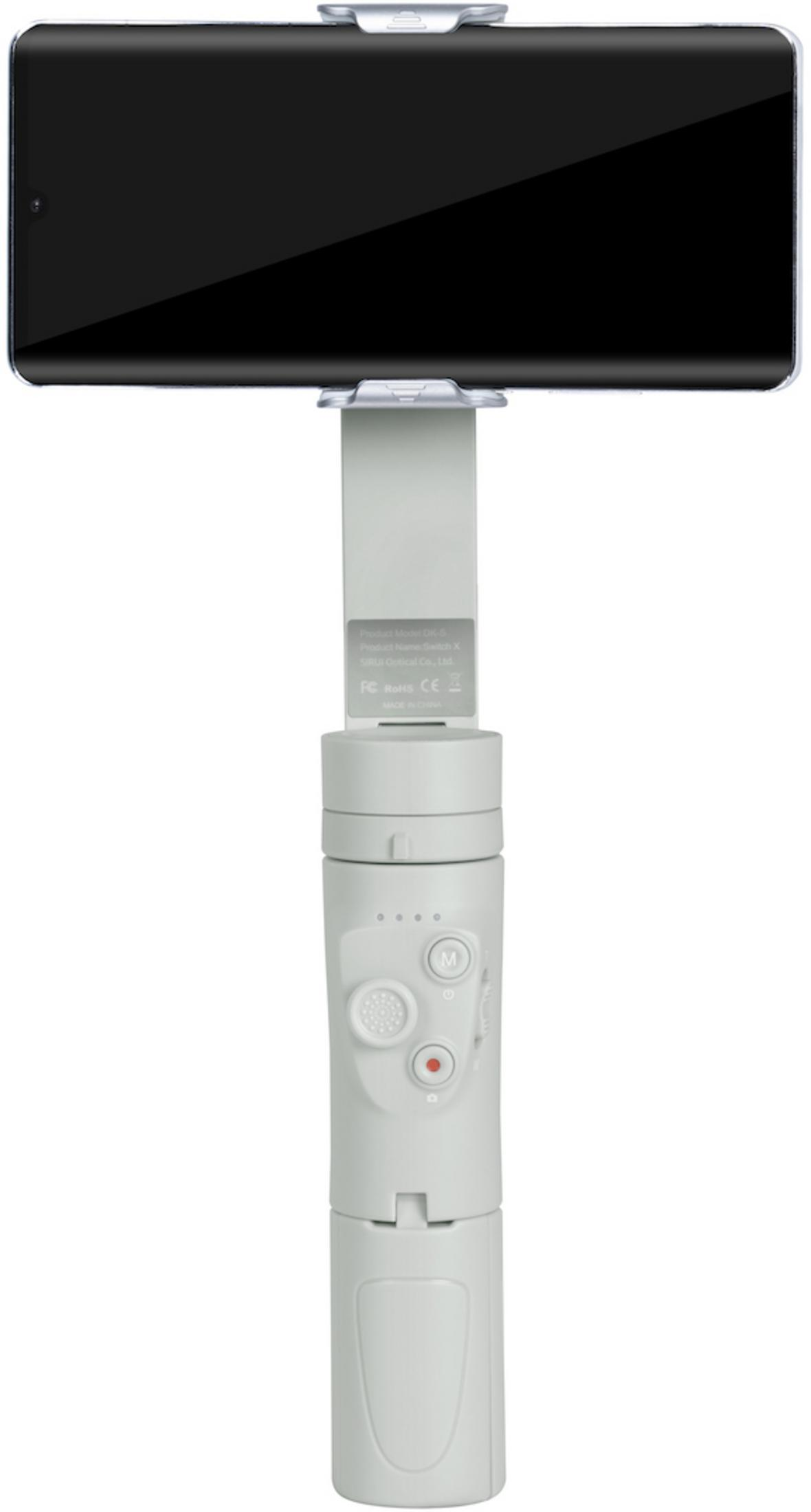 Un cardan blanc tient un smartphone noir horizontalement. Il y a des boutons de commande.