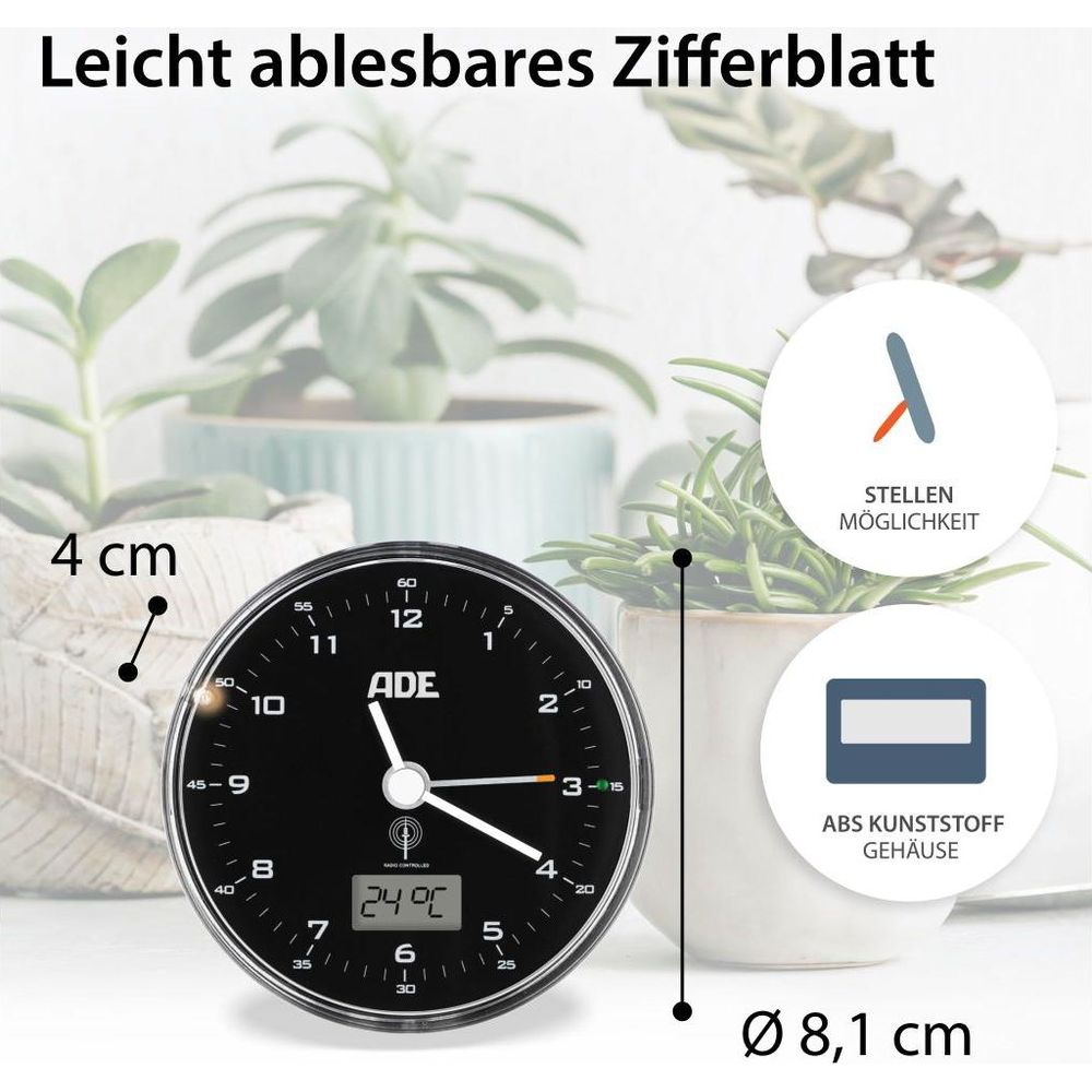 Orologio ADE nero con testo bianco, display digitale e piante.