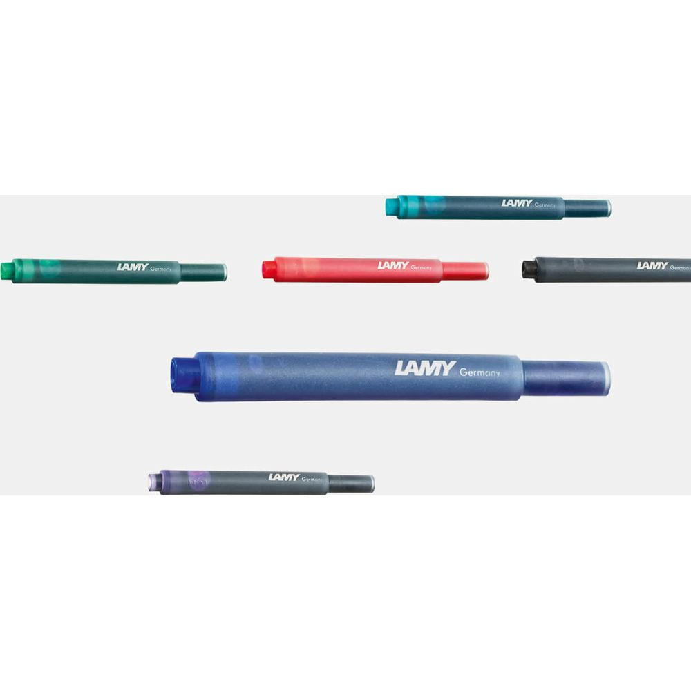 Sechs Lamy-Füller: blau, grün, rot, schwarz, türkis, lila.