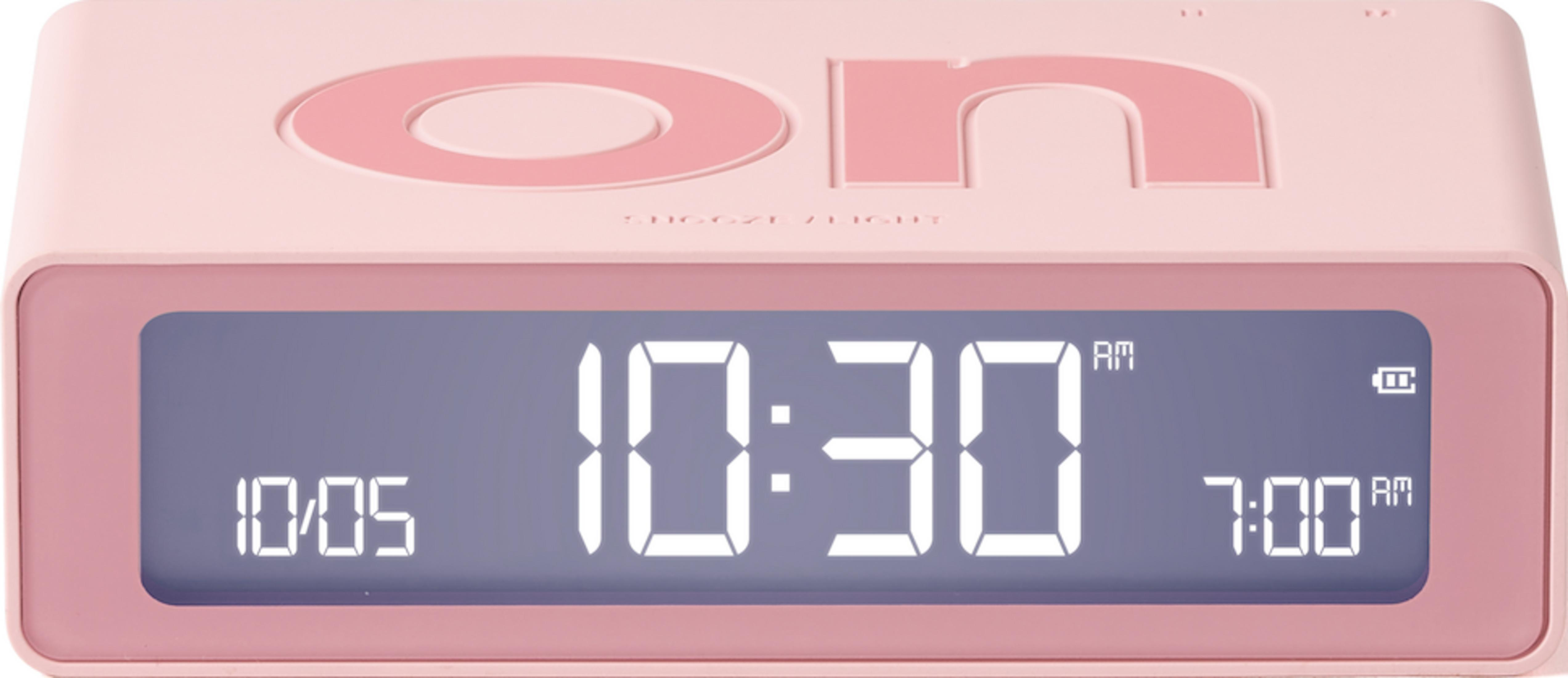 Ein rosafarbener Wecker zeigt 10:30 AM und 7:00 AM an.